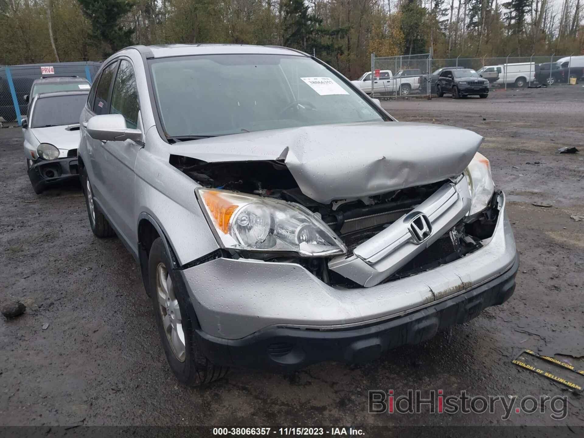 Photo JHLRE48739C004561 - HONDA CR-V 2009