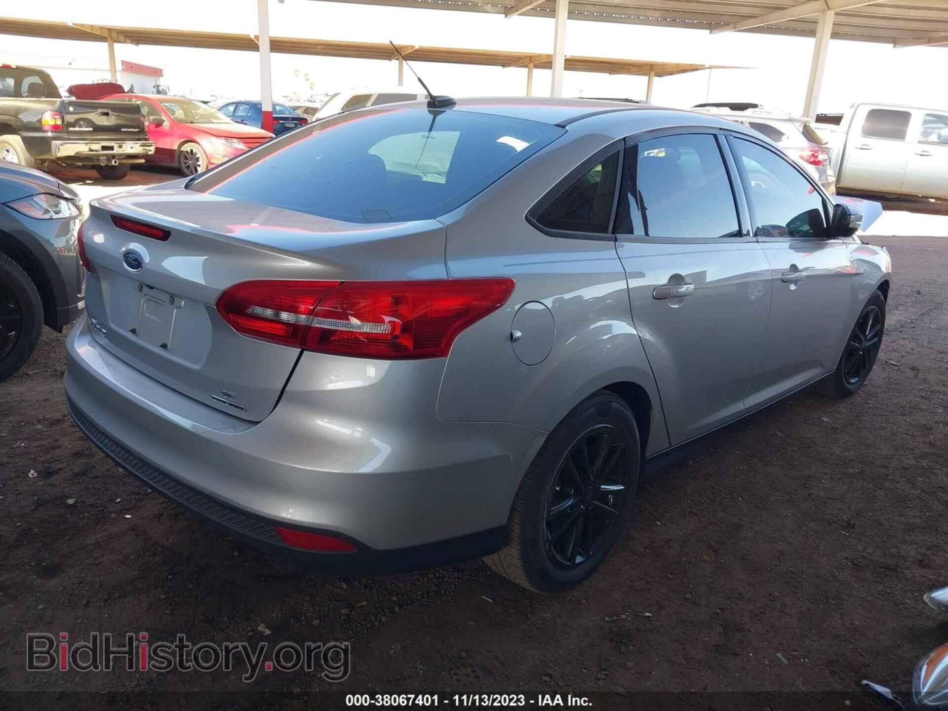 2016 FORD FOCUS - VIN: 1FADP3F23GL392011 - Фото 4
