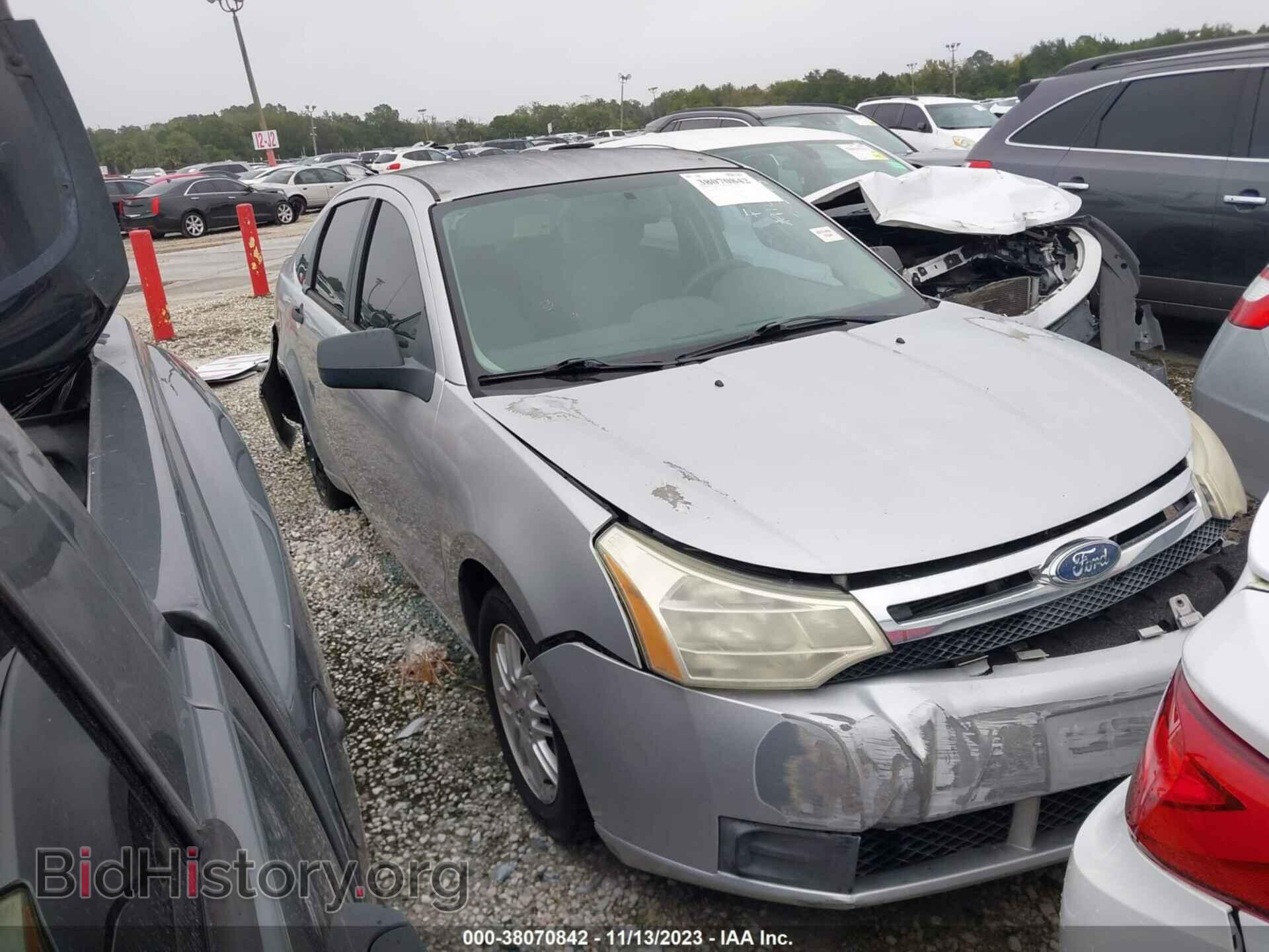 Фотография 1FAHP35N09W138514 - FORD FOCUS 2009