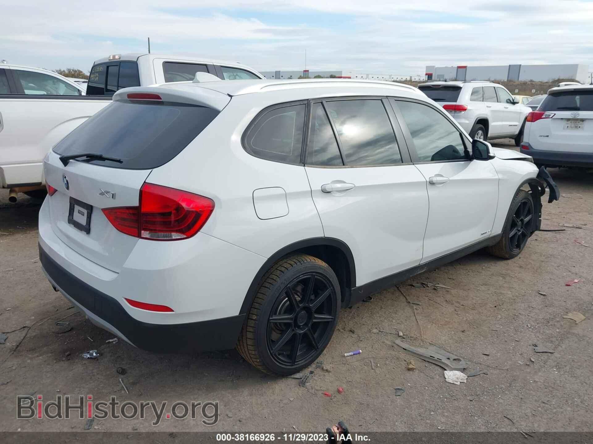 2014 BMW X1 - VIN: WBAVM5C53EVV91575 - Фото 4
