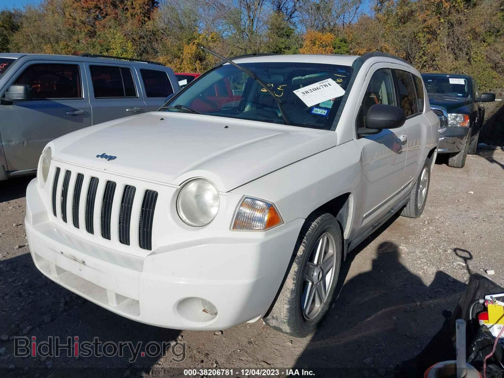 2010 JEEP COMPASS - VIN: 1J4NT4FA9AD594161 - Photo 2