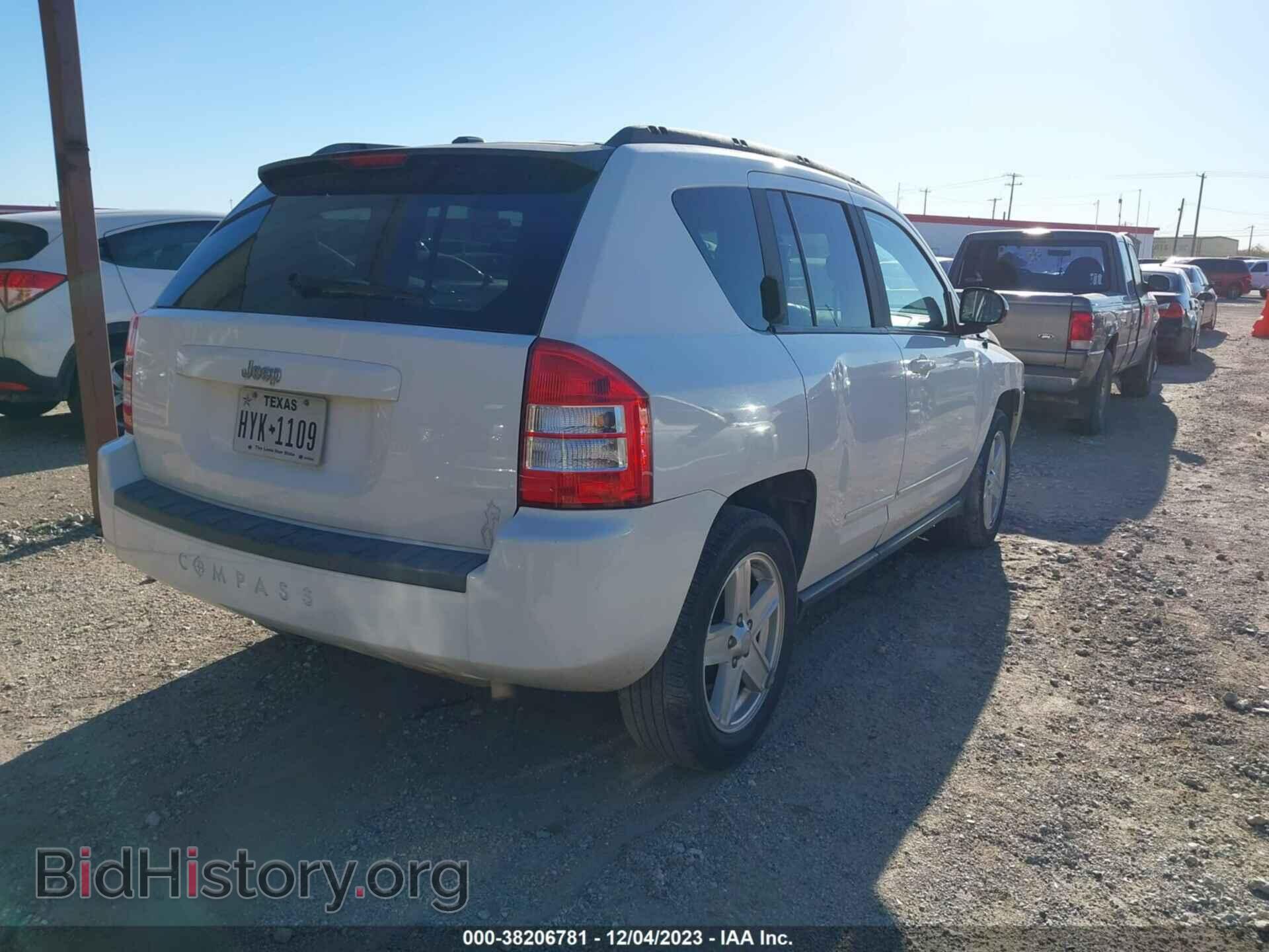 2010 JEEP COMPASS - VIN: 1J4NT4FA9AD594161 - Photo 4