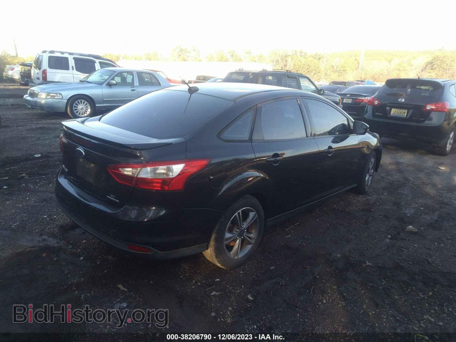 2014 FORD FOCUS - VIN: 1FADP3F22EL217780 - Photo 4