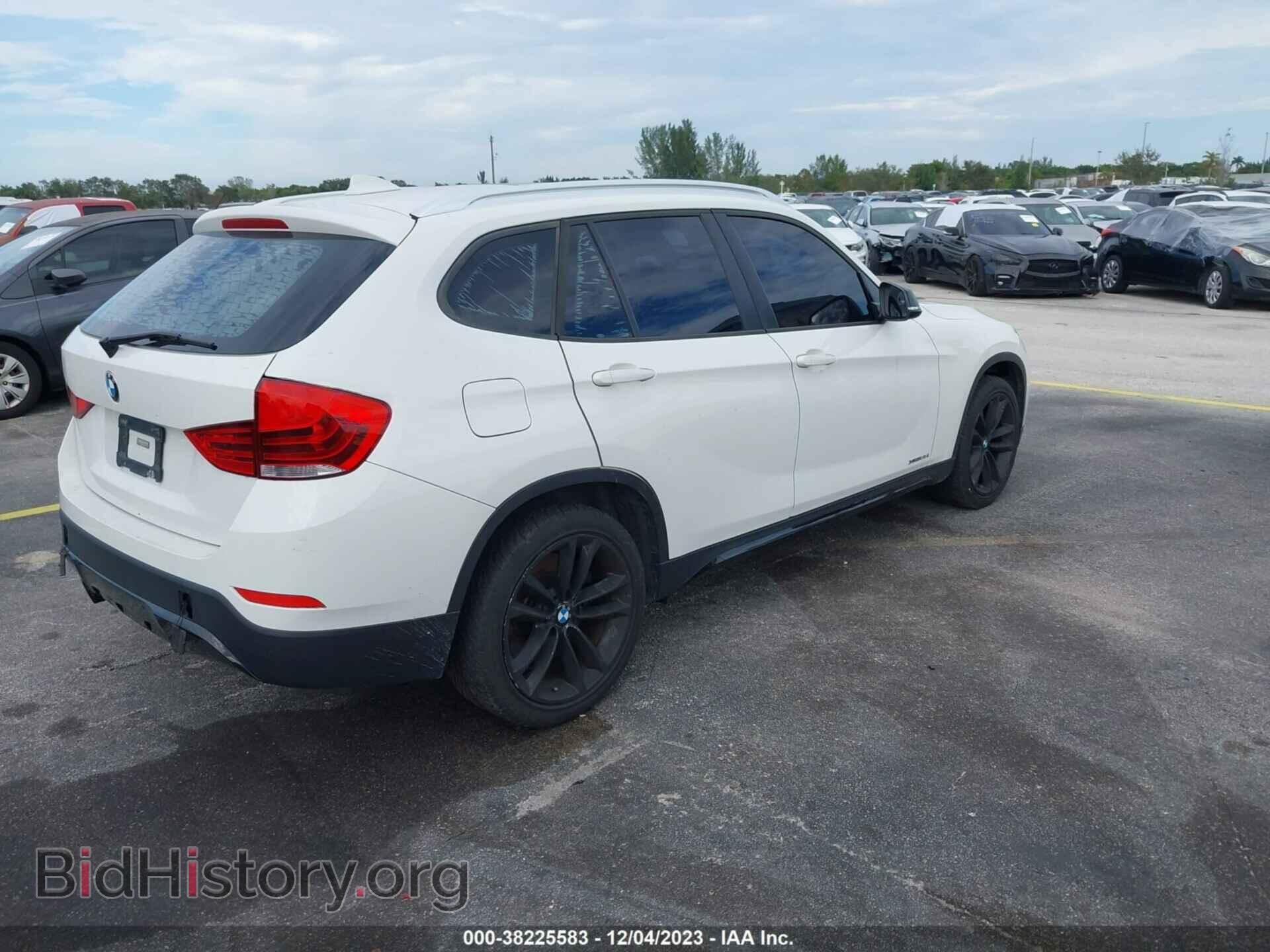 2014 BMW X1 - VIN: WBAVM5C55EVV91819 - Фото 4