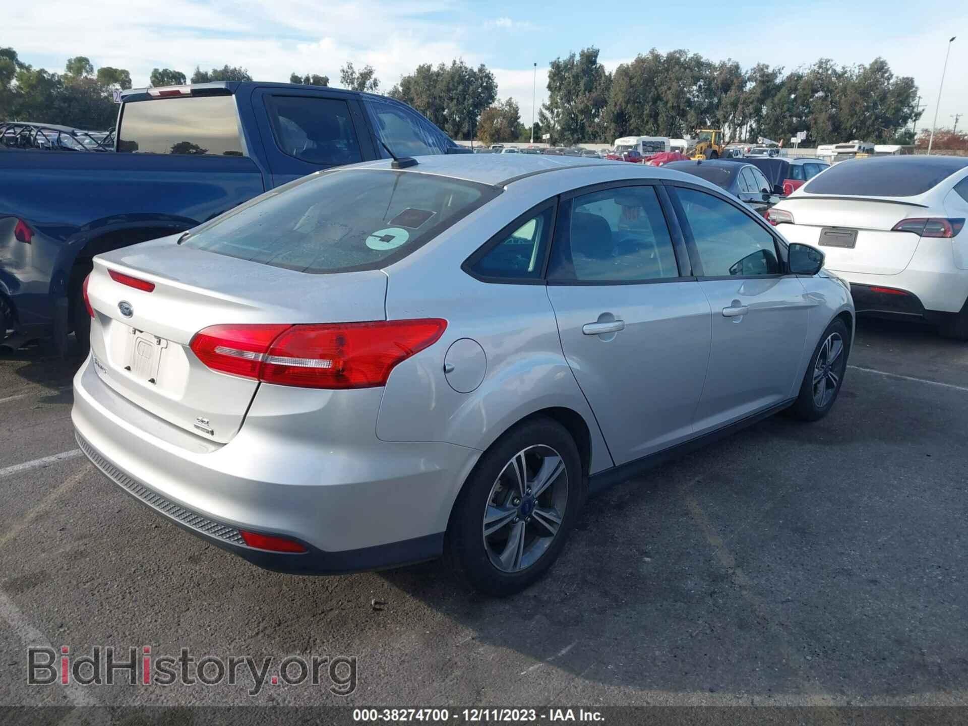 2016 FORD FOCUS - VIN: 1FADP3FEXGL310477 - Photo 4