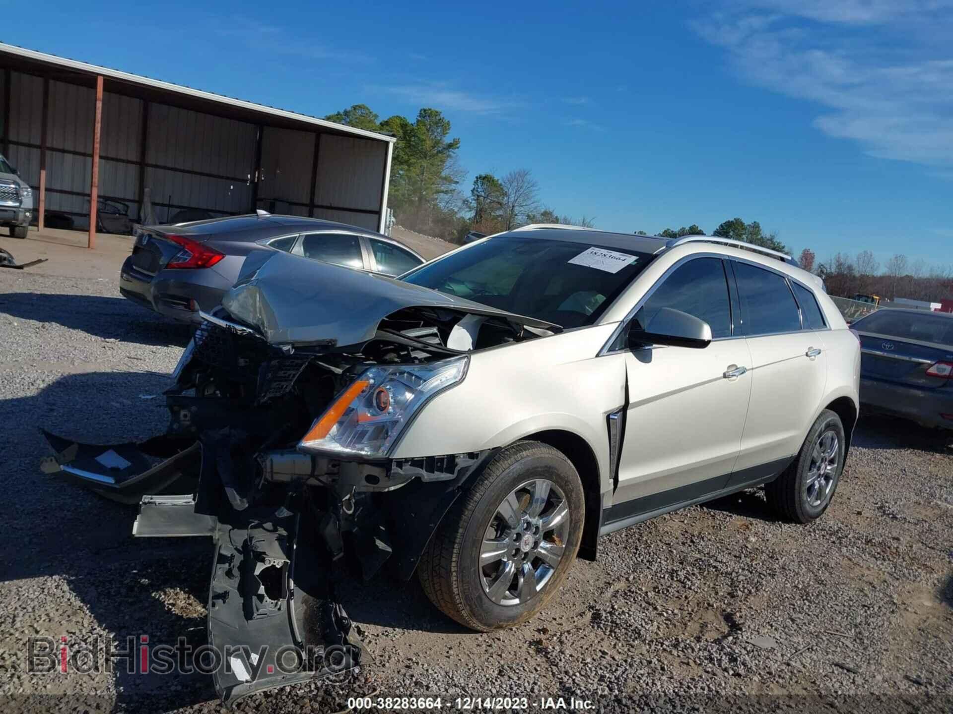 2014 CADILLAC SRX - VIN: 3GYFNBE31ES659550 - Фото 2