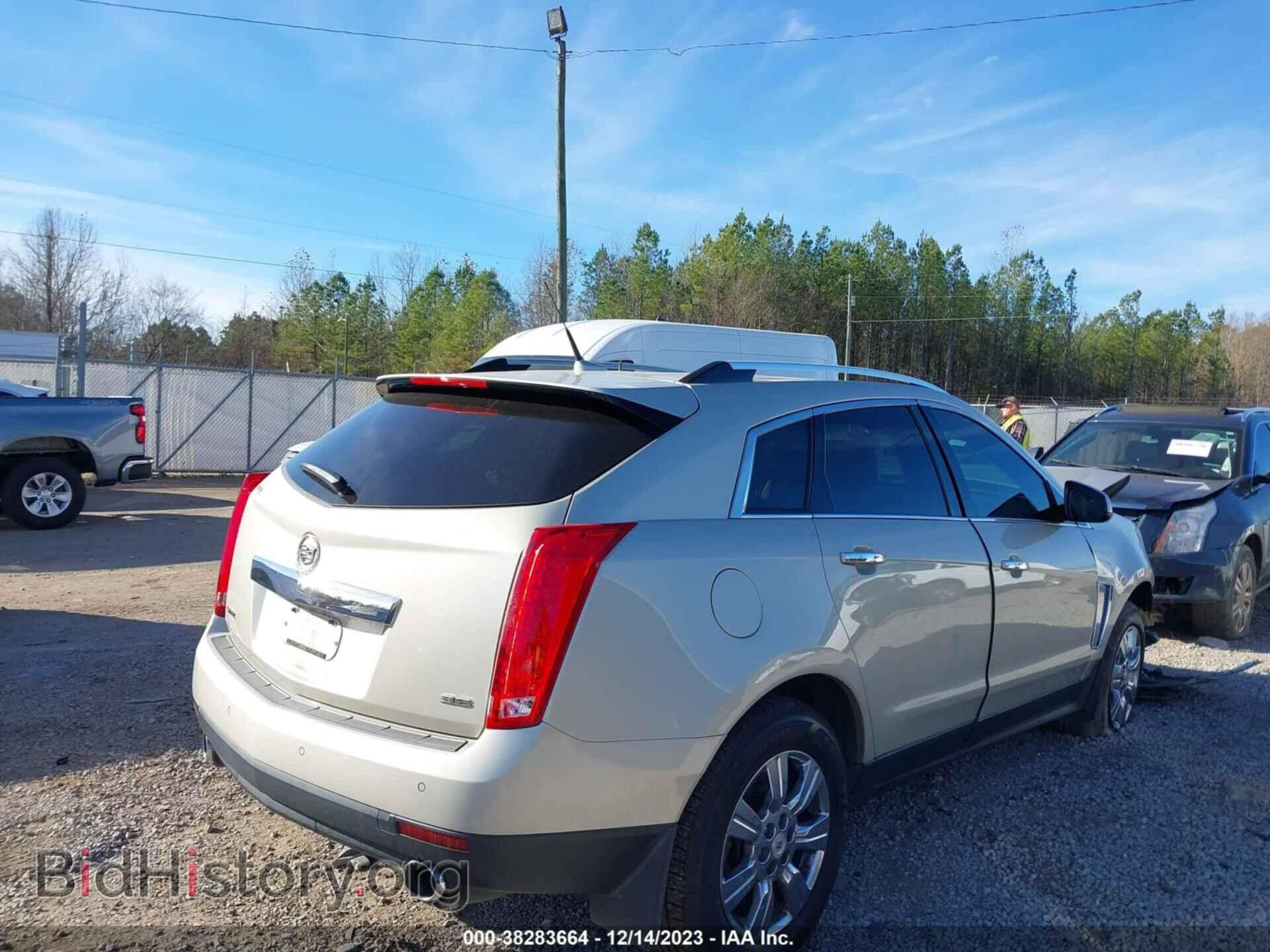 2014 CADILLAC SRX - VIN: 3GYFNBE31ES659550 - Фото 4