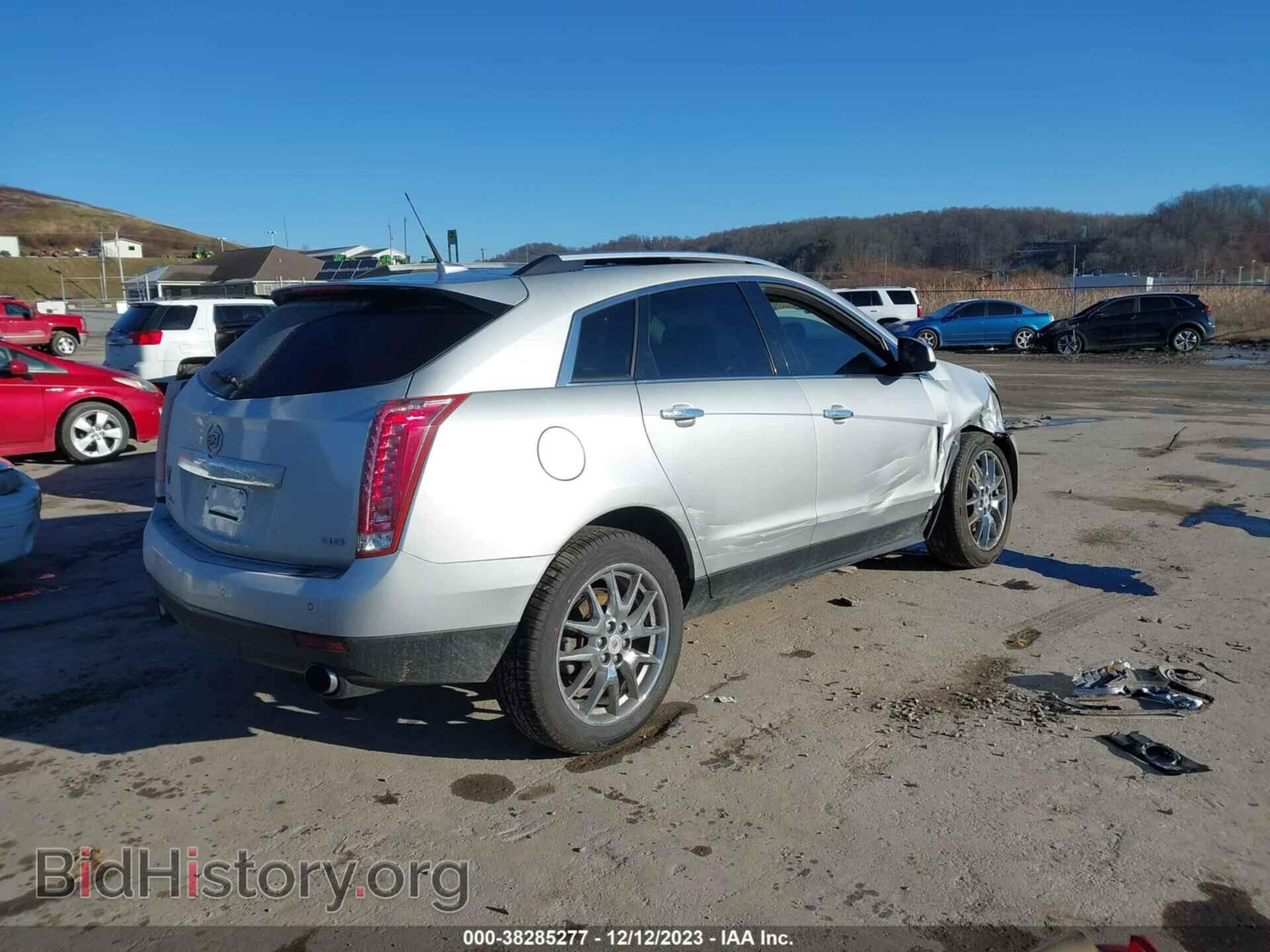 2014 CADILLAC SRX - VIN: 3GYFNFE37ES674822 - Фото 4