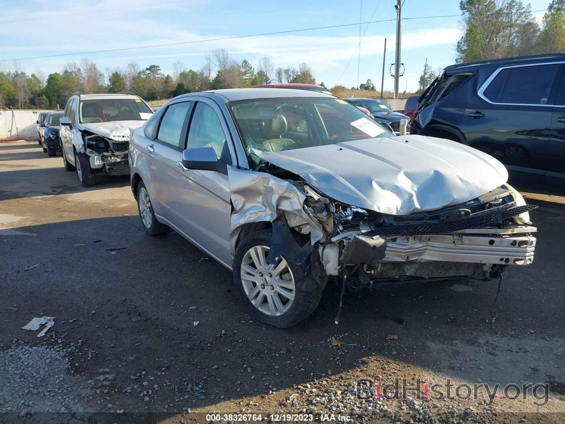 Photo 1FAHP37NX9W111138 - FORD FOCUS 2009