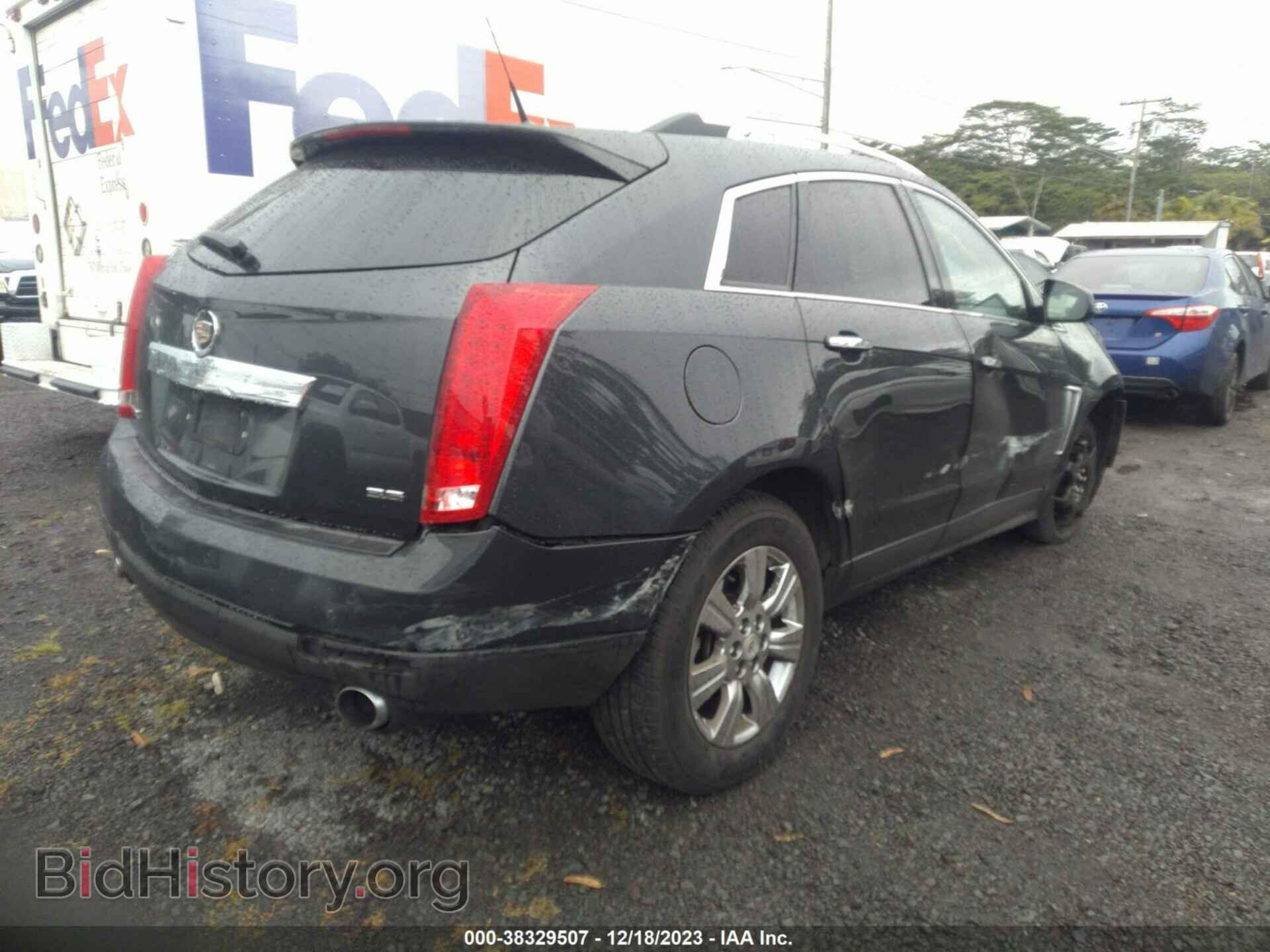 2014 CADILLAC SRX - VIN: 3GYFNBE30ES566809 - Фото 4