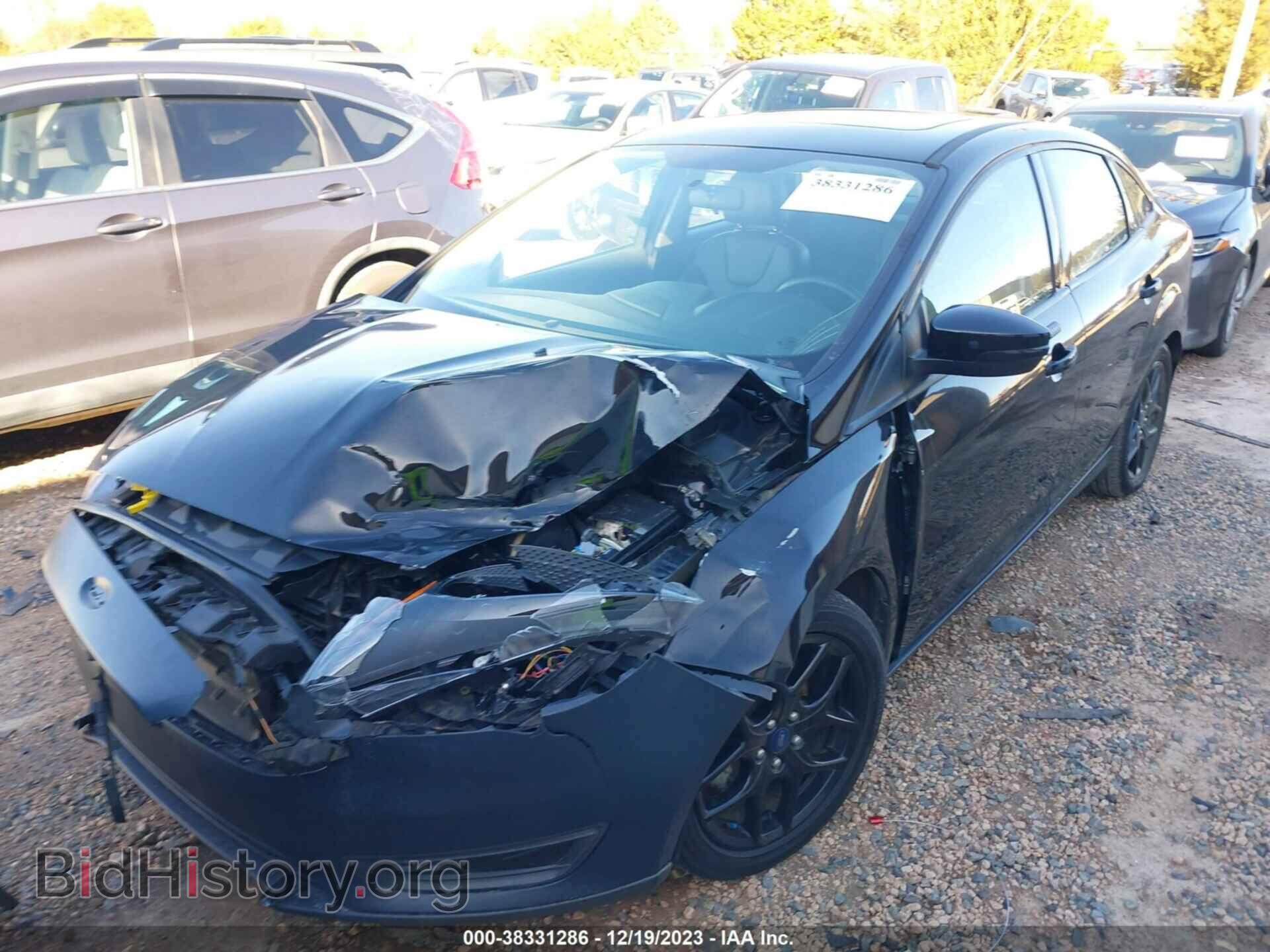 2016 FORD FOCUS - VIN: 1FADP3F21GL401627 - Фото 2