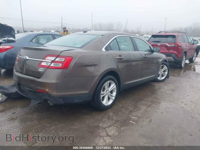 2015 Ford TAURUS (VIN 1FAHP2H80FG189291) — фото 4 из 12