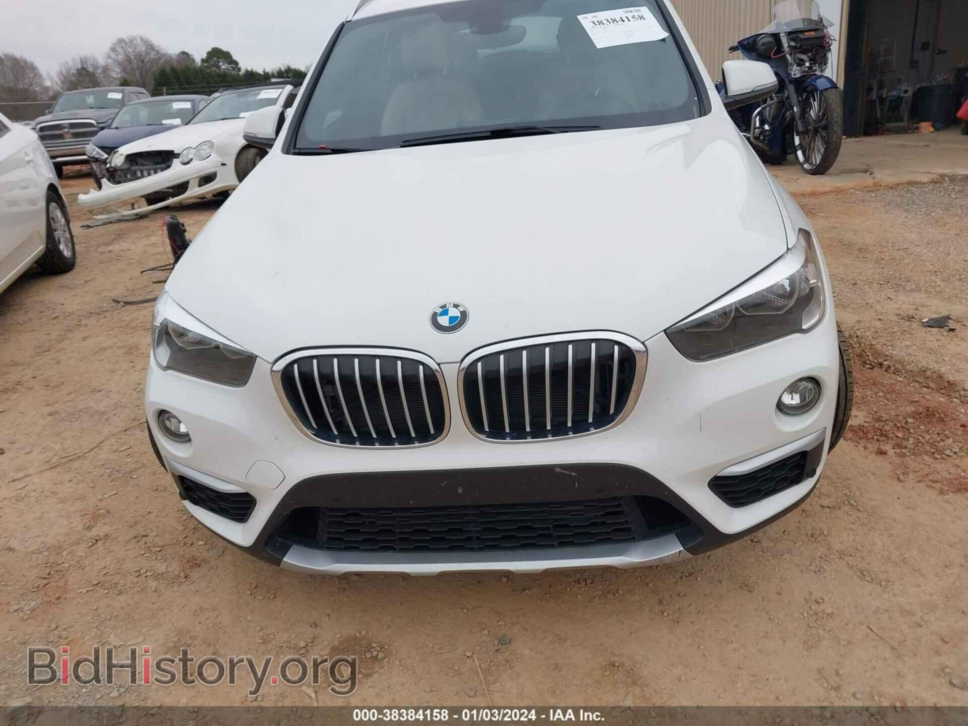 2017 BMW X1 - VIN: WBXHT3C37H5F75332 - Фото 12