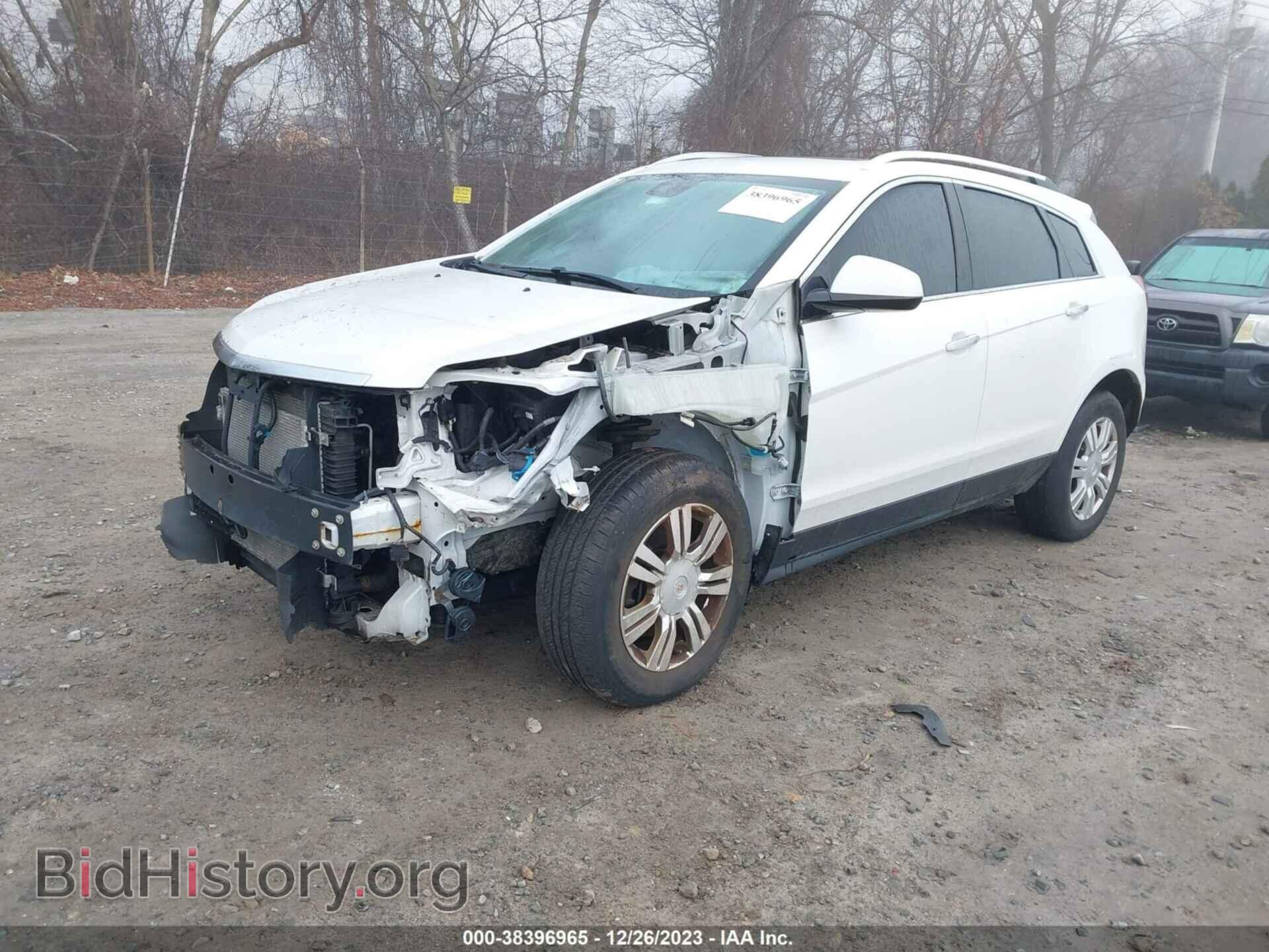 2014 CADILLAC SRX - VIN: 3GYFNEE32ES524305 - Фото 2