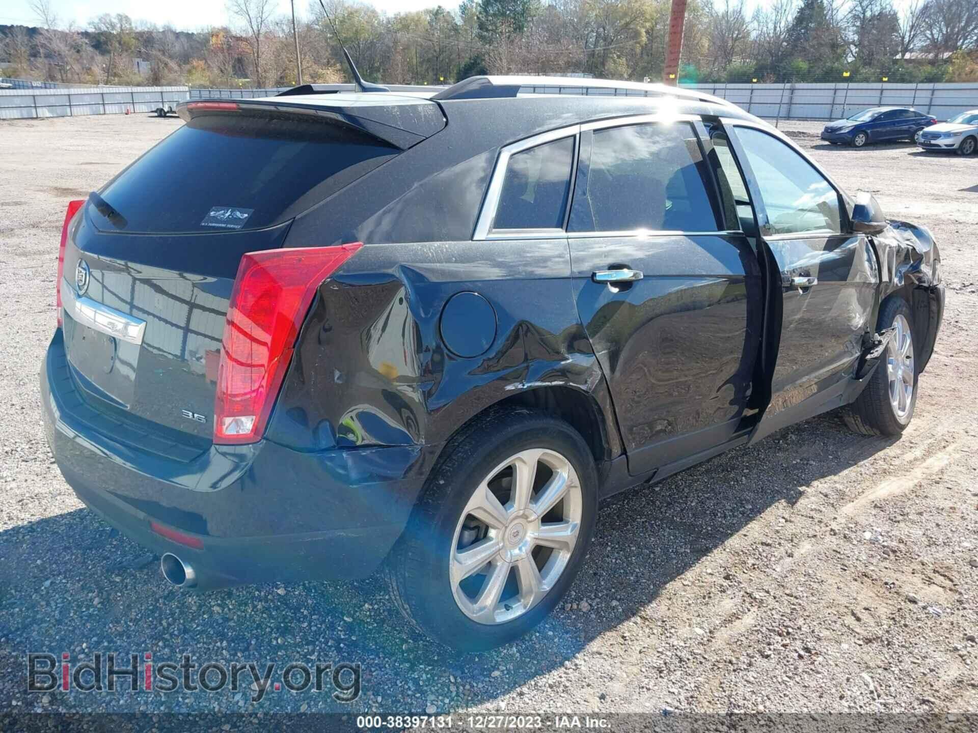 2014 CADILLAC SRX - VIN: 3GYFNCE33ES543661 - Фото 4