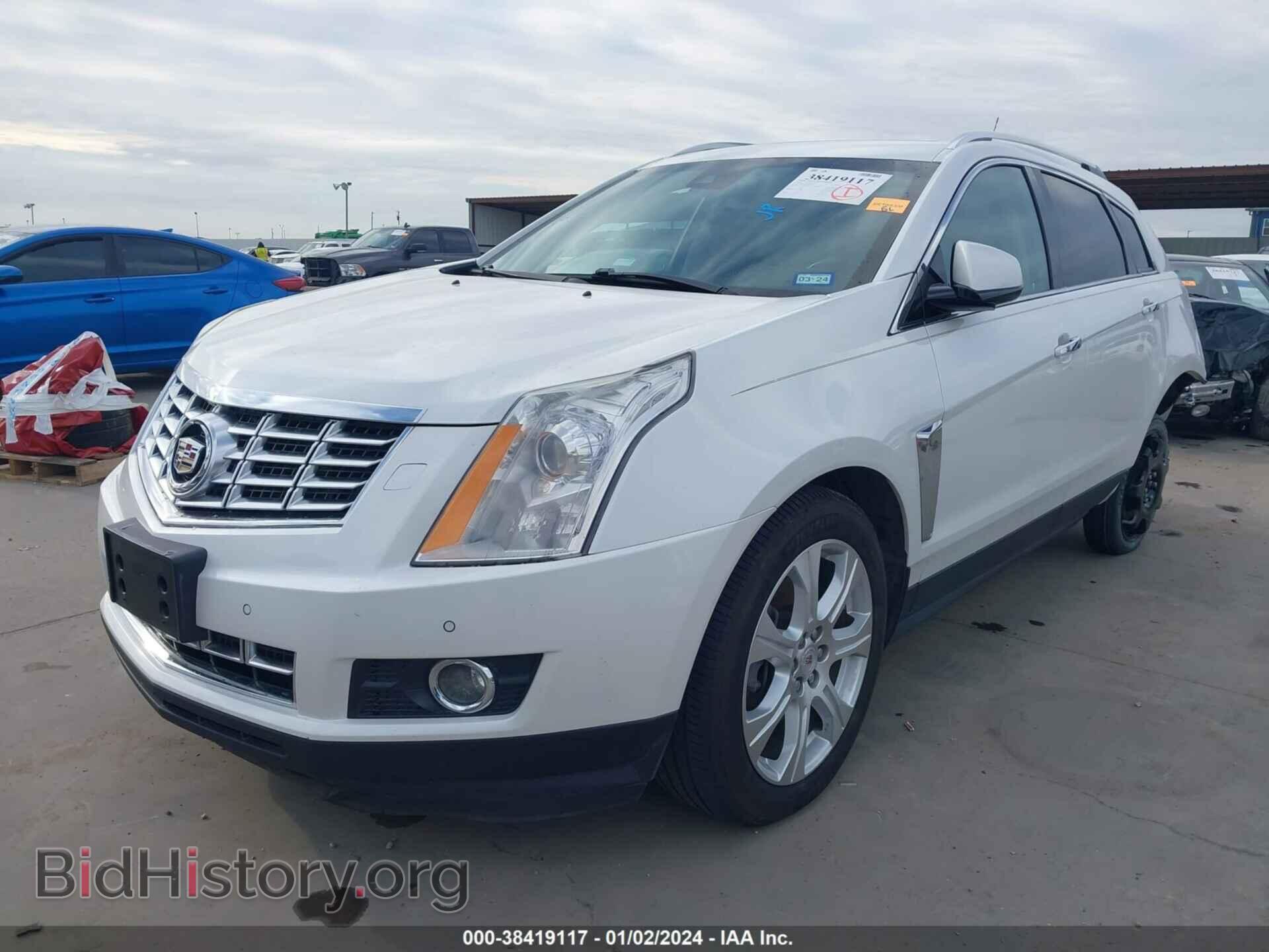 2014 CADILLAC SRX - VIN: 3GYFNDE39ES560146 - Фото 2