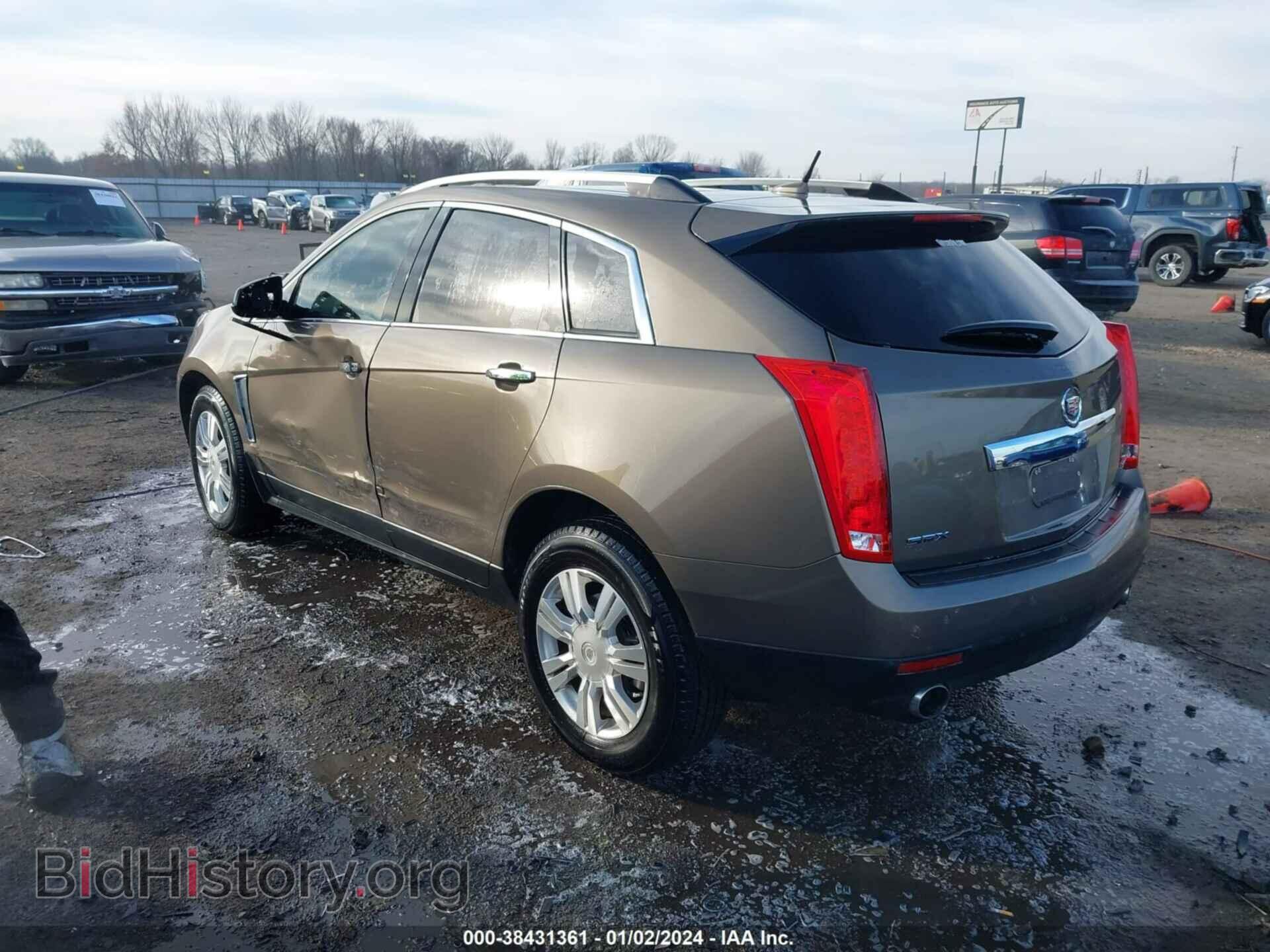 2014 CADILLAC SRX - VIN: 3GYFNBE35ES597716 - Фото 3