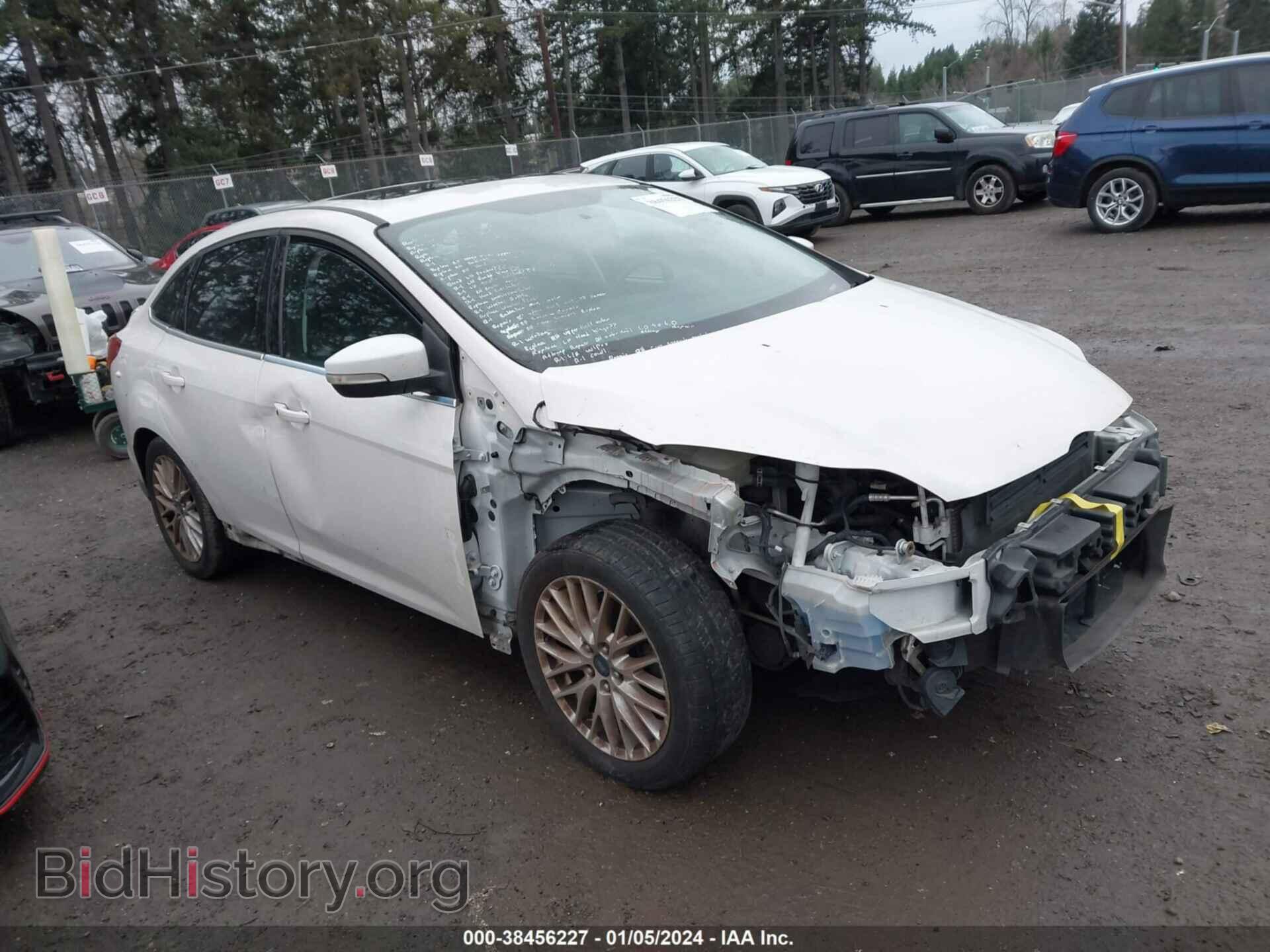 Фотография 1FADP3J21DL124528 - FORD FOCUS 2013