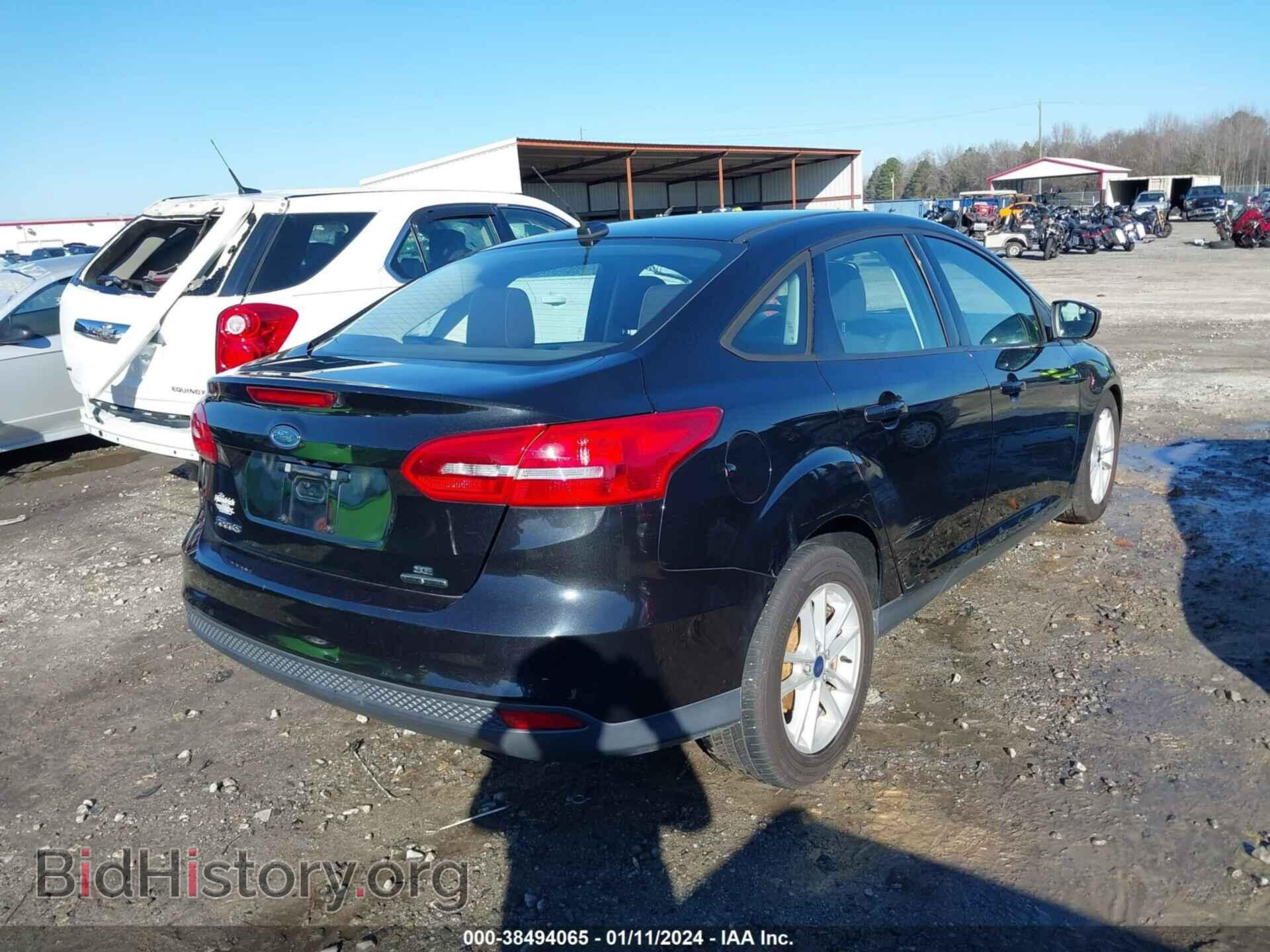 2015 FORD FOCUS - VIN: 1FADP3F22FL217036 - Photo 4