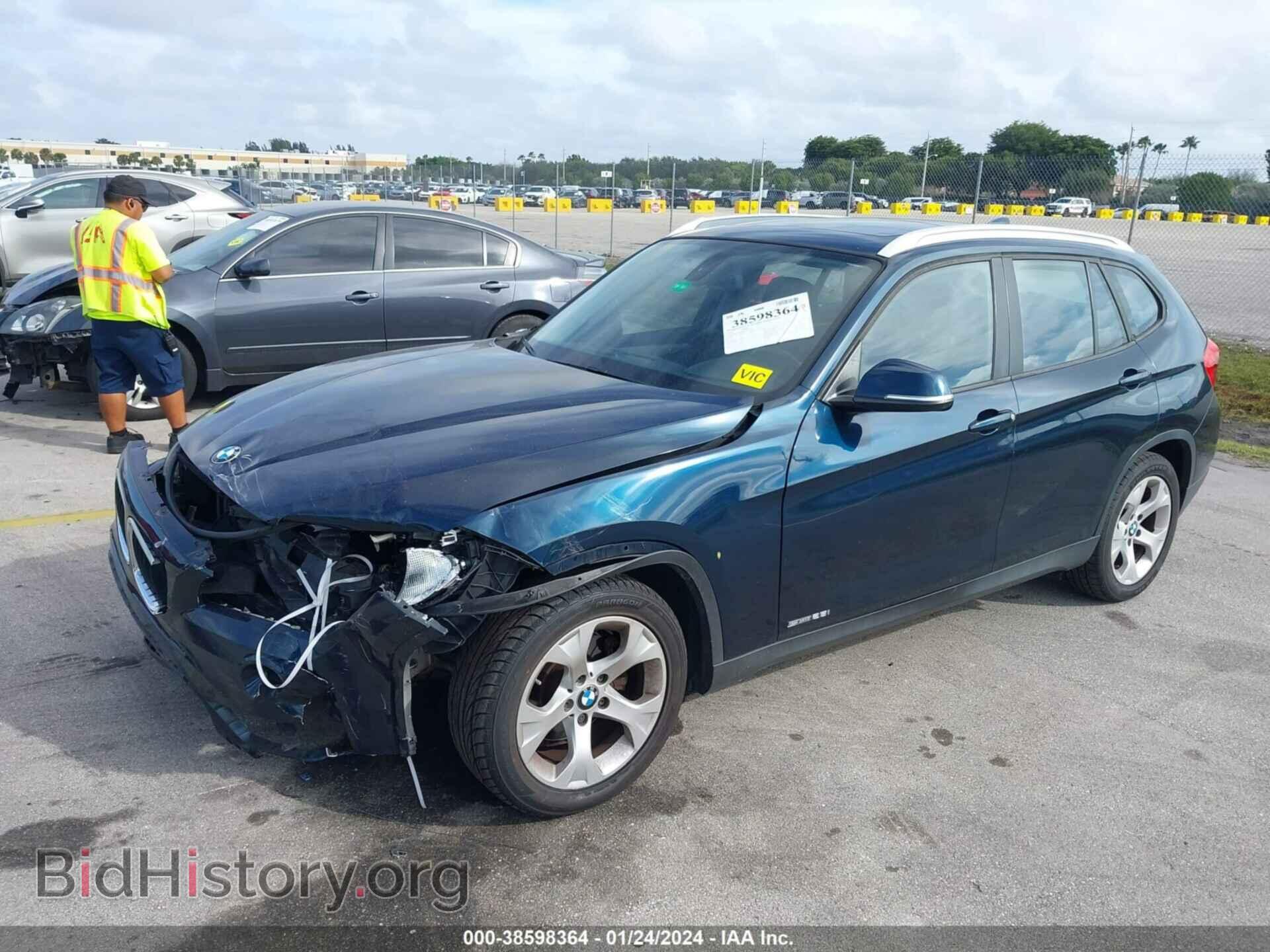 2014 BMW X1 - VIN: WBAVM1C52EVW47949 - Фото 2