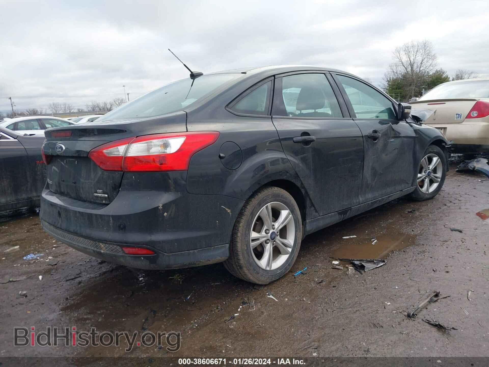 2014 FORD FOCUS - VIN: 1FADP3F23EL310713 - Photo 4