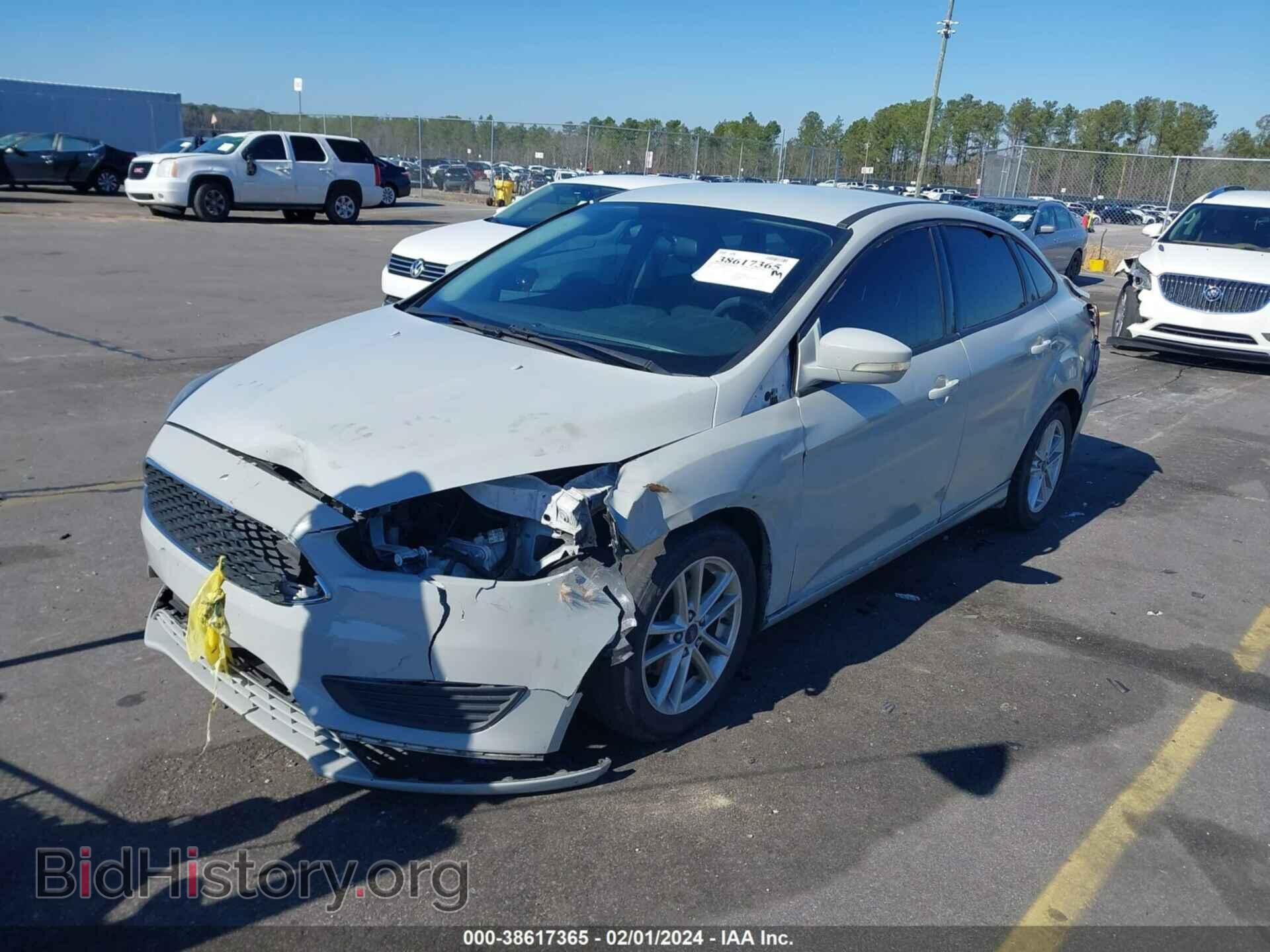 2016 FORD FOCUS - VIN: 1FADP3F20GL319551 - Фото 2