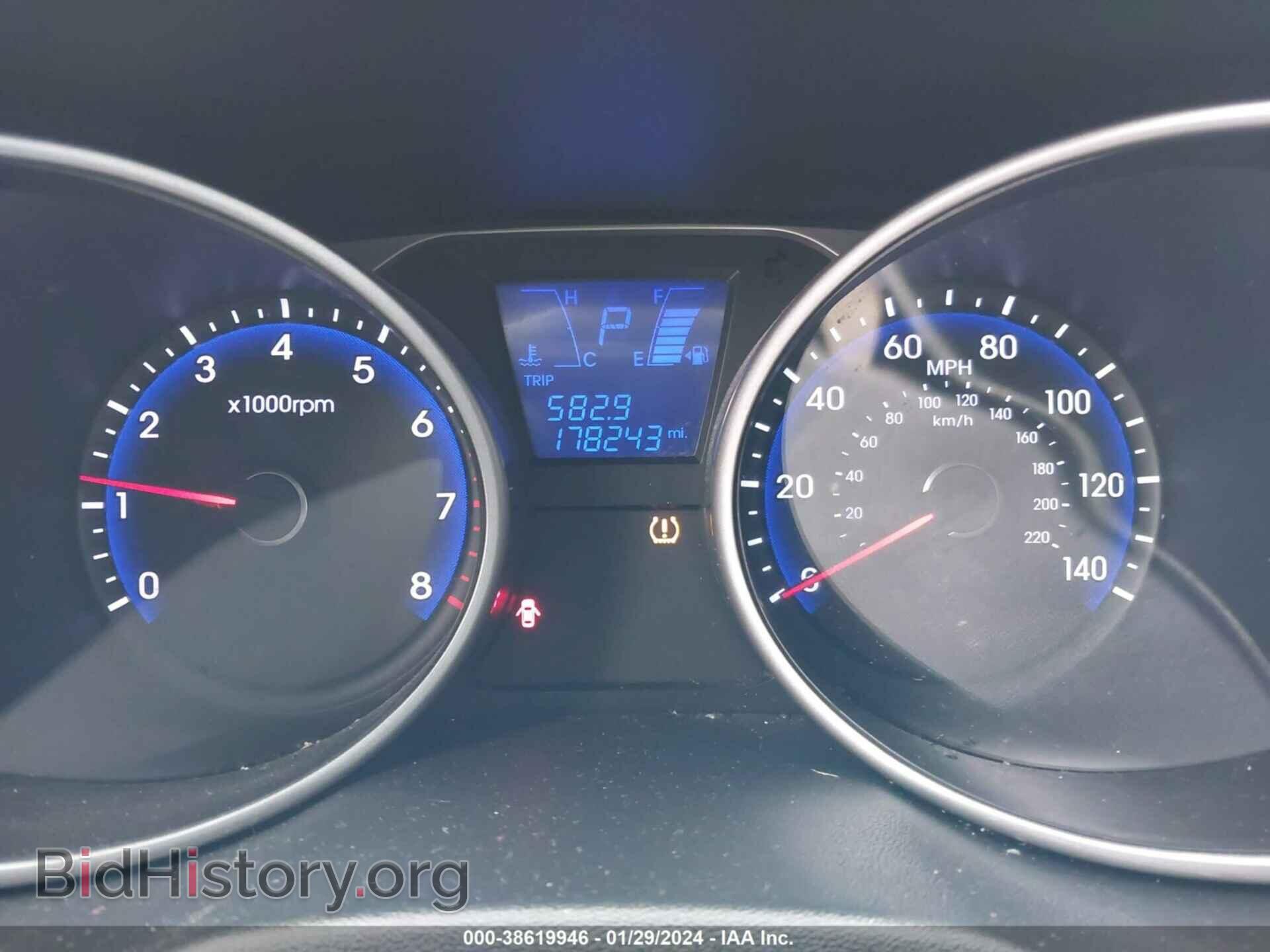 2012 HYUNDAI TUCSON - VIN: KM8JUCAC6CU371014 - Фото 7