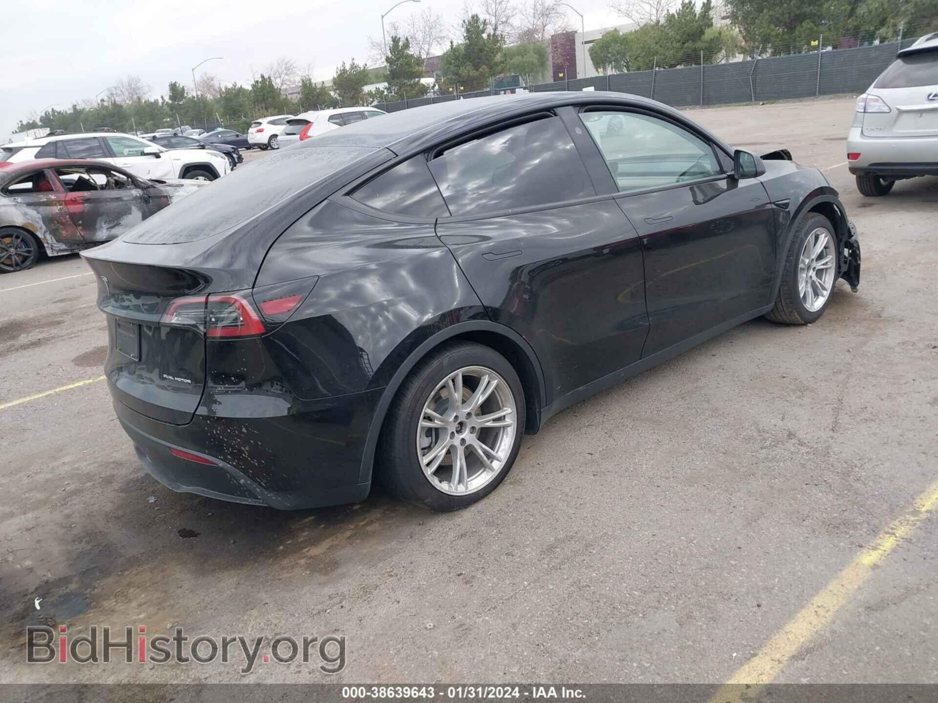2023 TESLA MODEL Y - VIN: 7SAYGAEE2PF871702 - Фото 4