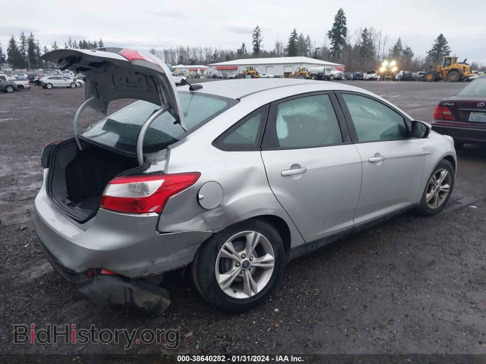 2014 FORD FOCUS - VIN: 1FADP3F21EL212831 - Photo 4