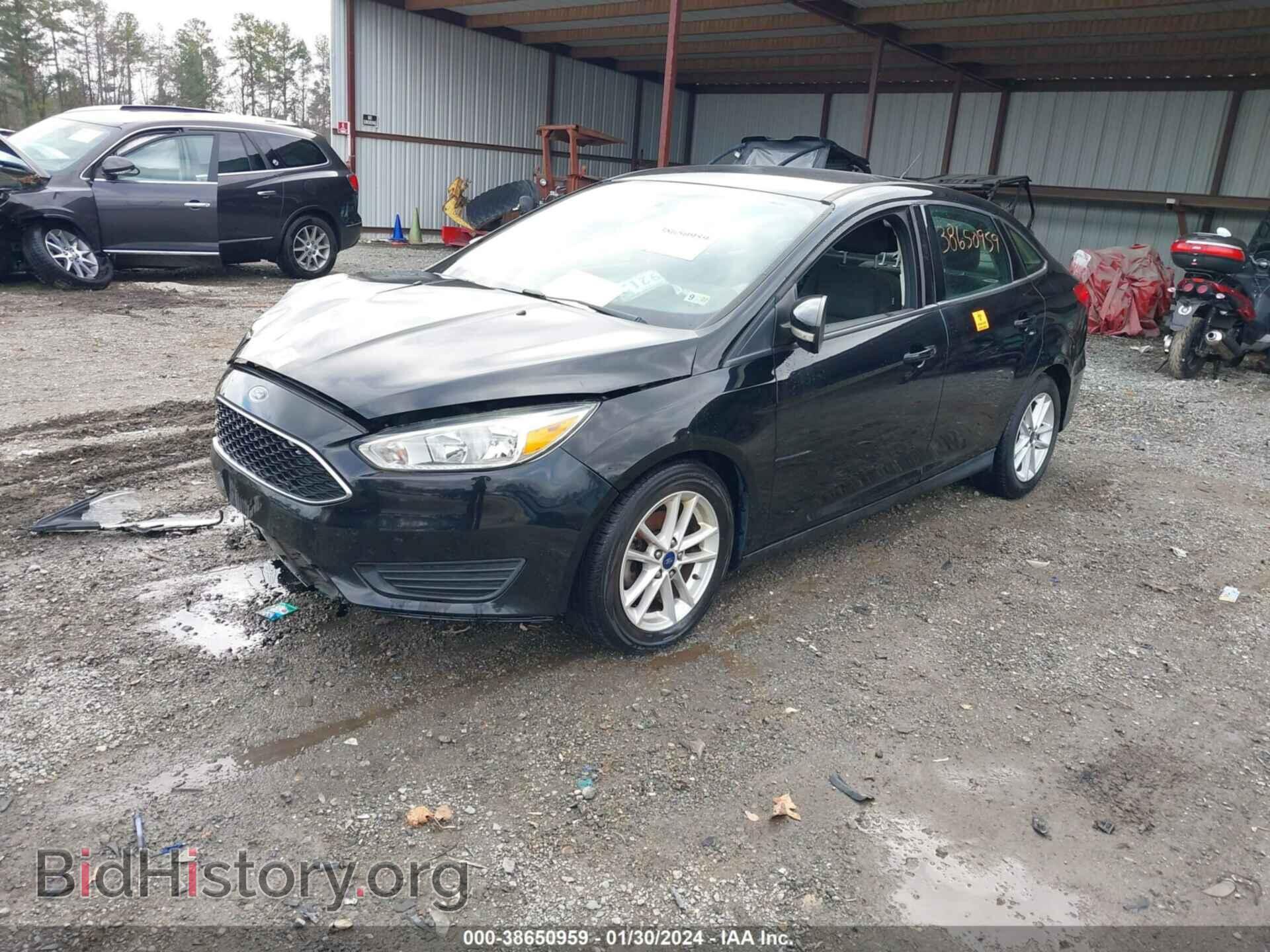 2016 FORD FOCUS - VIN: 1FADP3F21GL389995 - Фото 2