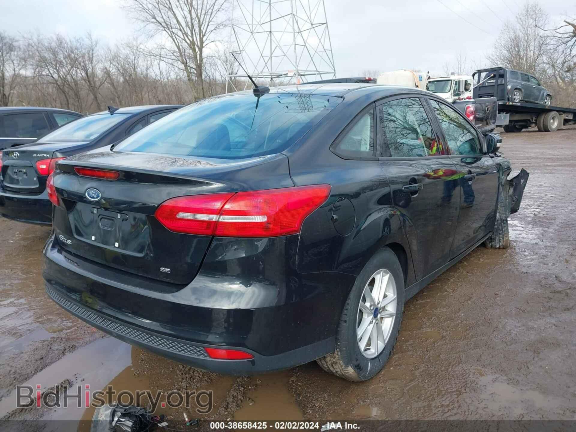 2015 FORD FOCUS - VIN: 1FADP3F26FL296565 - Photo 4