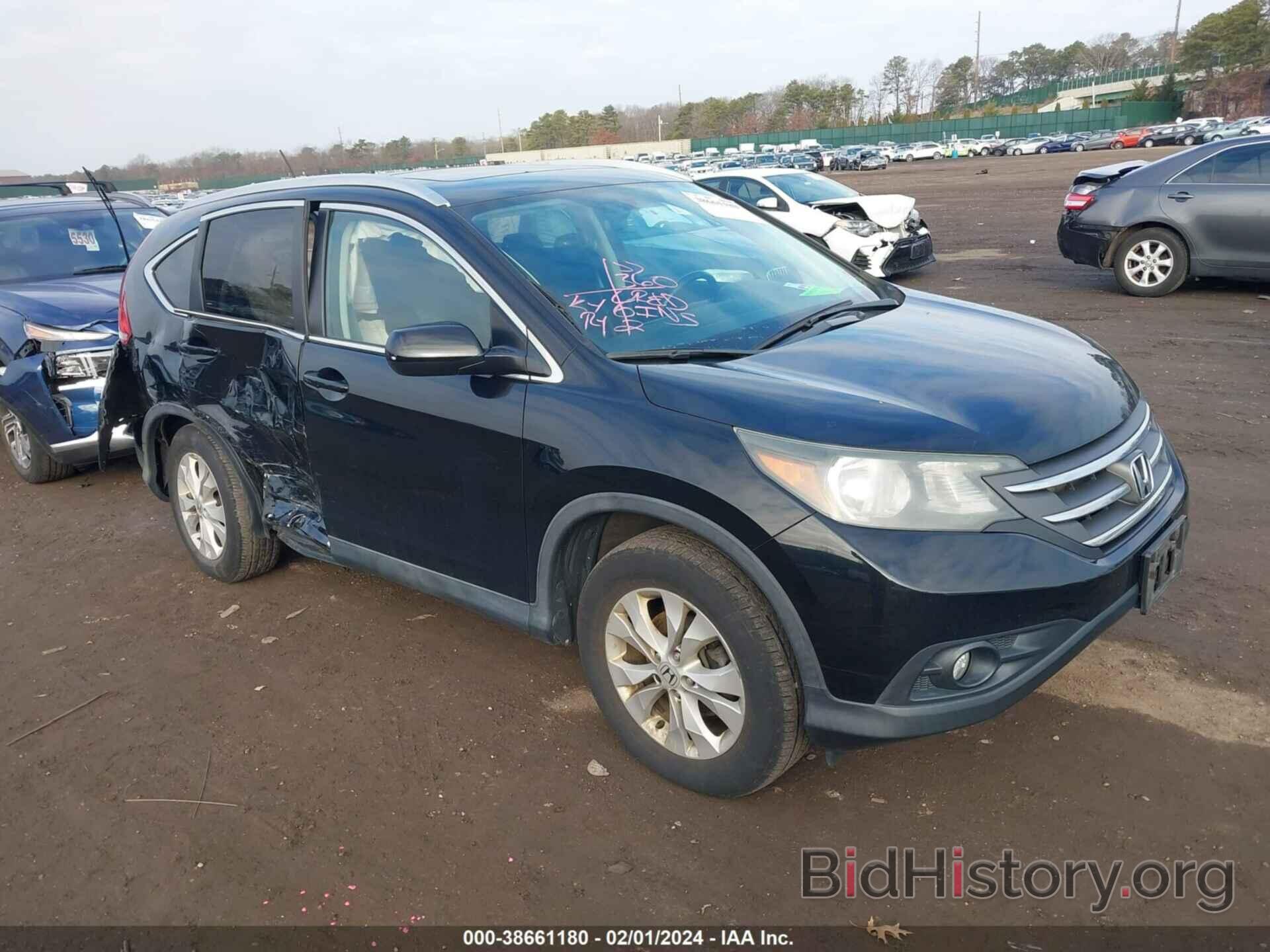 Фотография 2HKRM4H70EH666550 - HONDA CR-V 2014