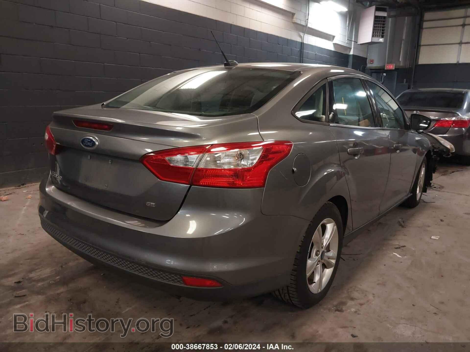 2014 FORD FOCUS - VIN: 1FADP3F21EL172041 - Photo 4