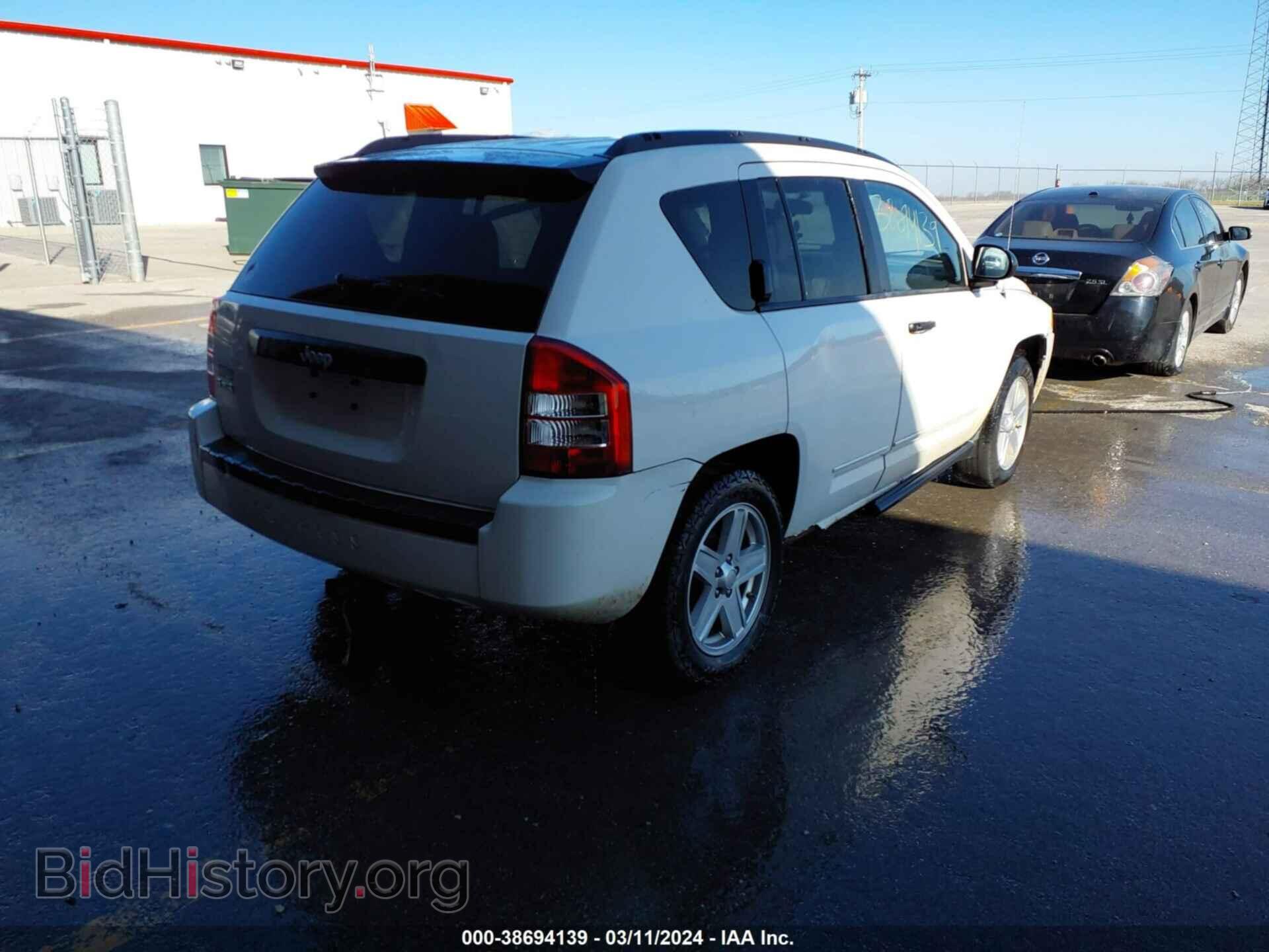 2010 JEEP COMPASS - VIN: 1J4NF1FB2AD623191 - Фото 4
