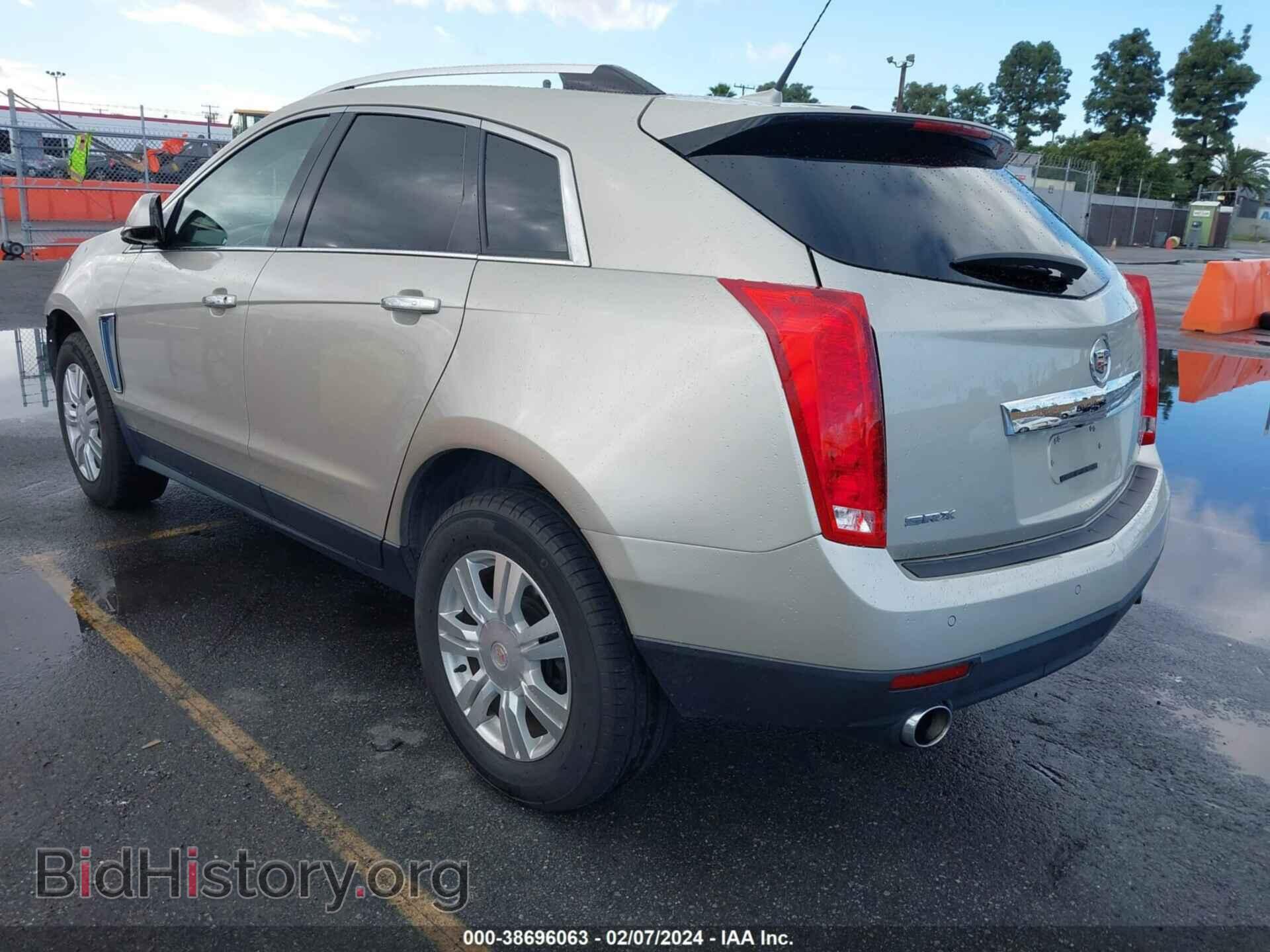 2014 CADILLAC SRX - VIN: 3GYFNBE32ES684750 - Фото 3