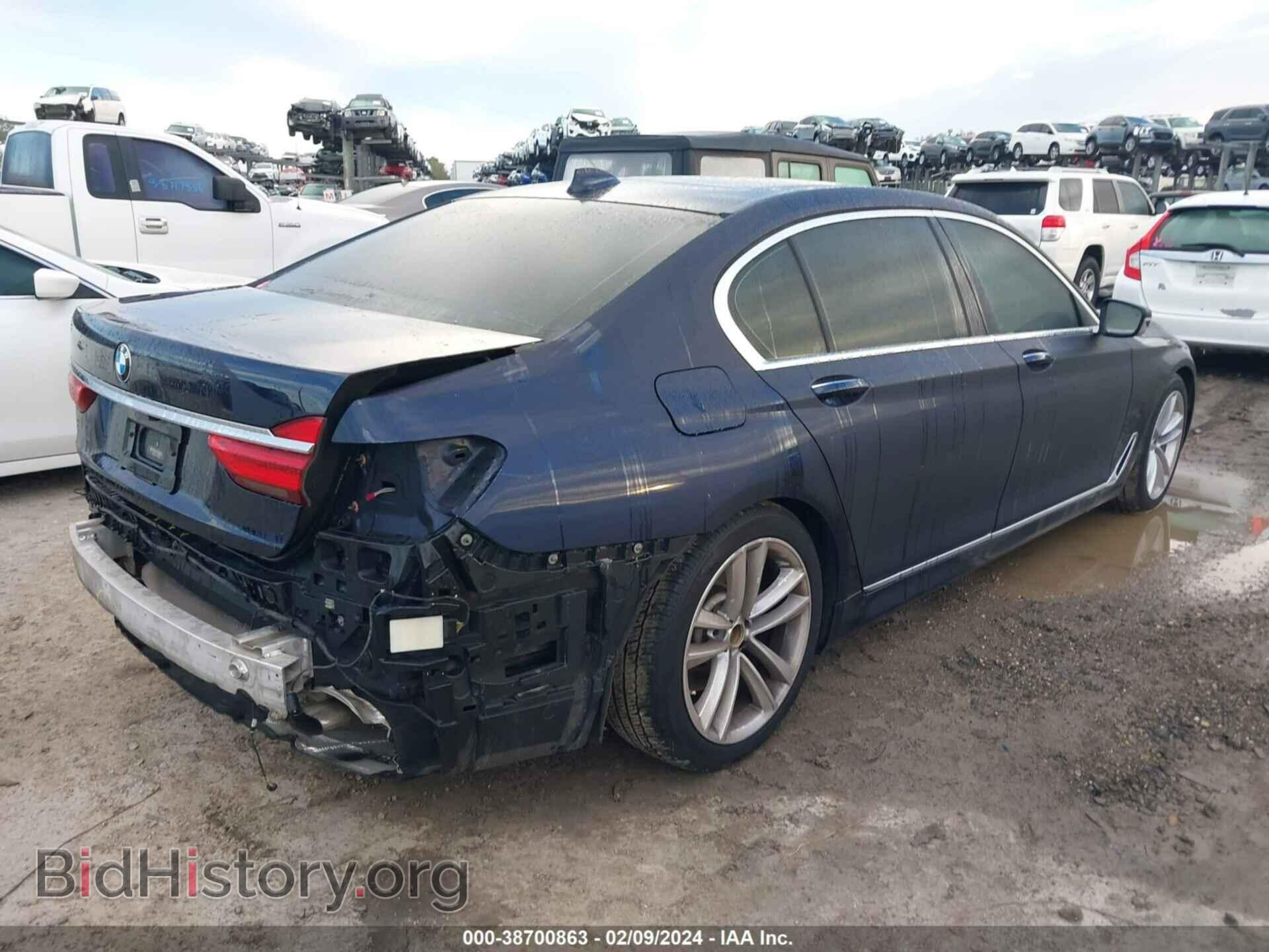 2016 BMW 740I - VIN: WBA7E2C53GG504303 - Фото 4