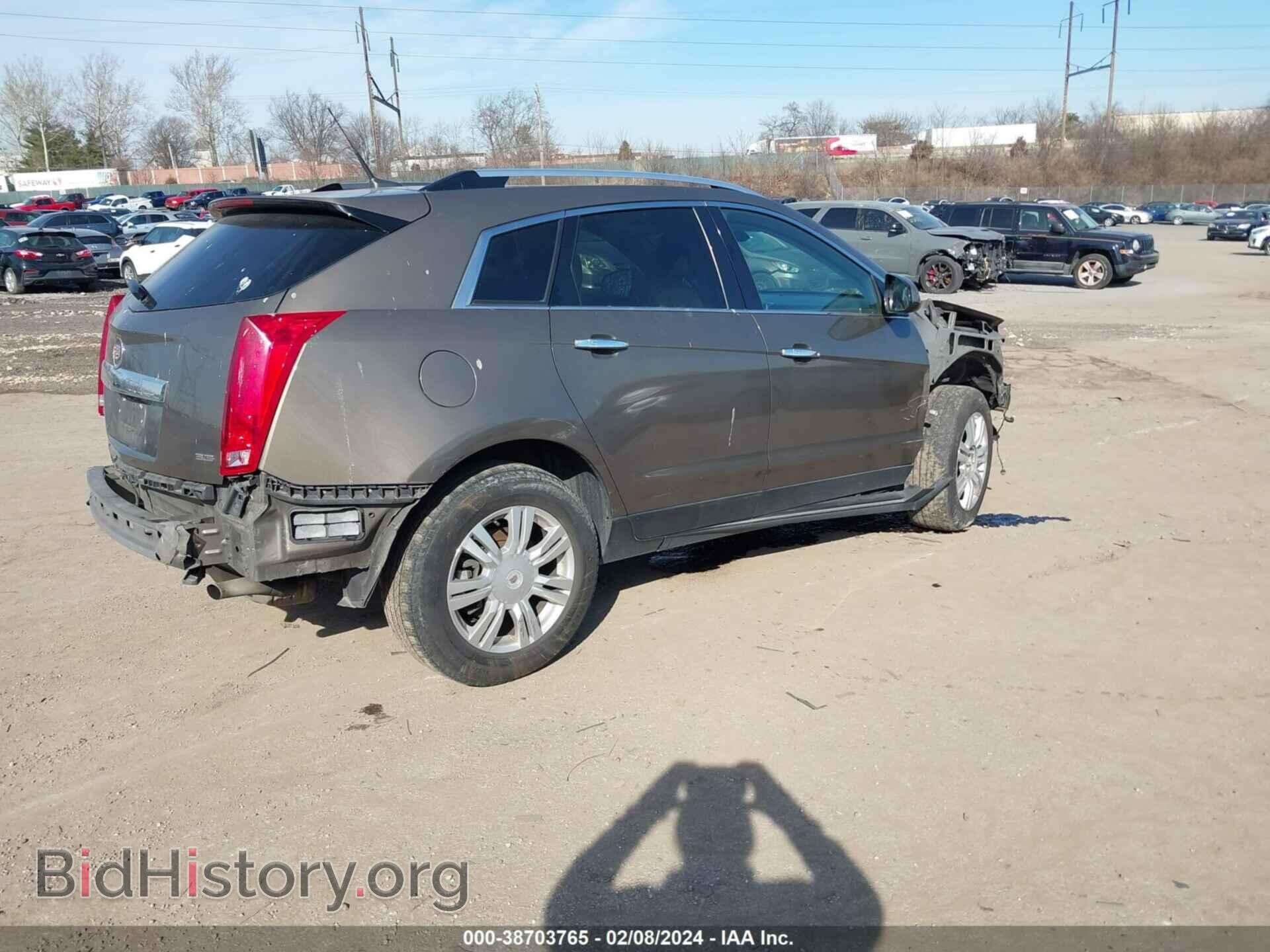 2014 CADILLAC SRX - VIN: 3GYFNBE30ES681782 - Фото 4