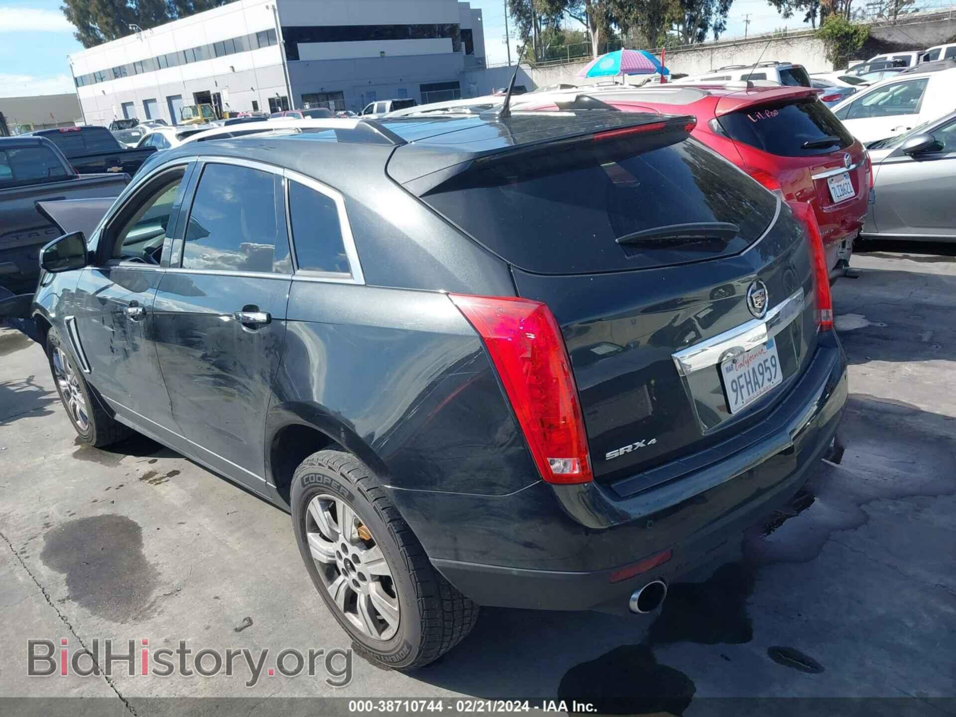 2014 CADILLAC SRX - VIN: 3GYFNEE30ES625391 - Фото 3