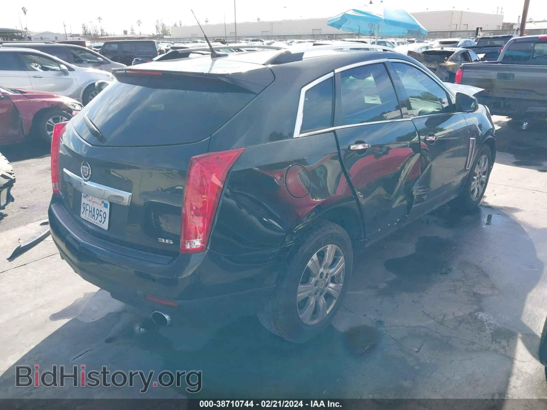 2014 CADILLAC SRX - VIN: 3GYFNEE30ES625391 - Фото 4