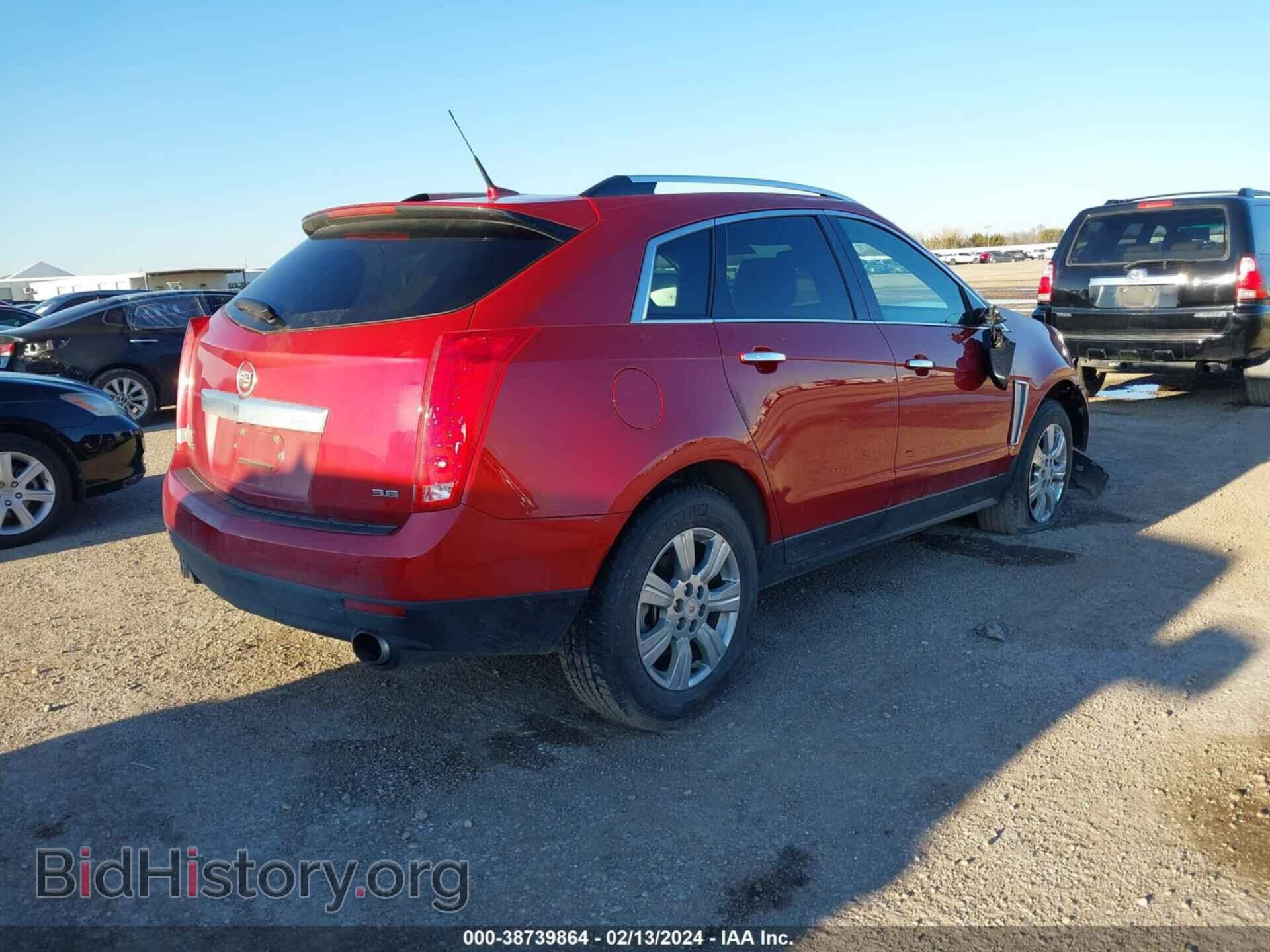 2014 CADILLAC SRX - VIN: 3GYFNBE31ES676588 - Фото 4