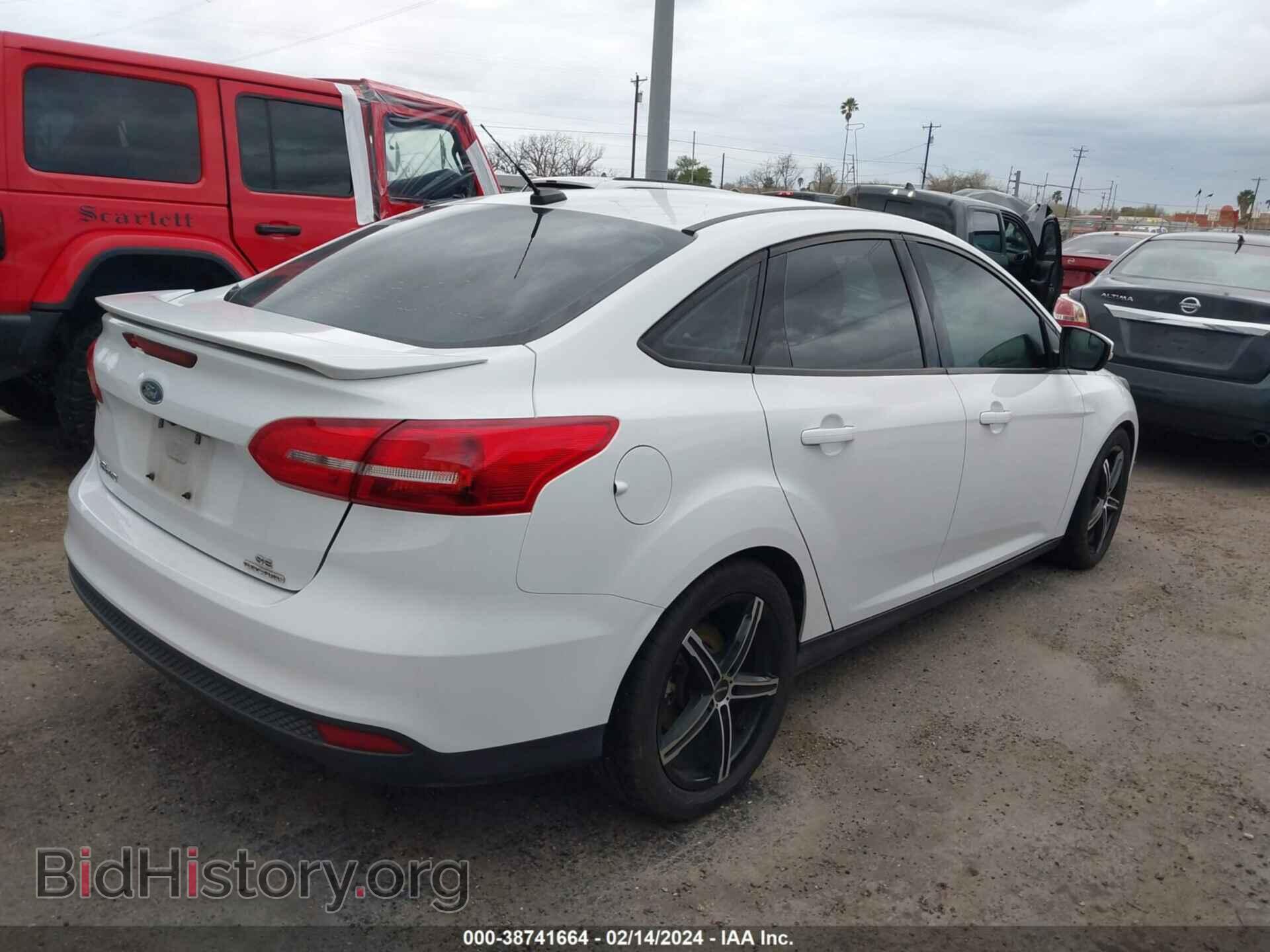 2015 FORD FOCUS - VIN: 1FADP3F22FL323499 - Photo 4