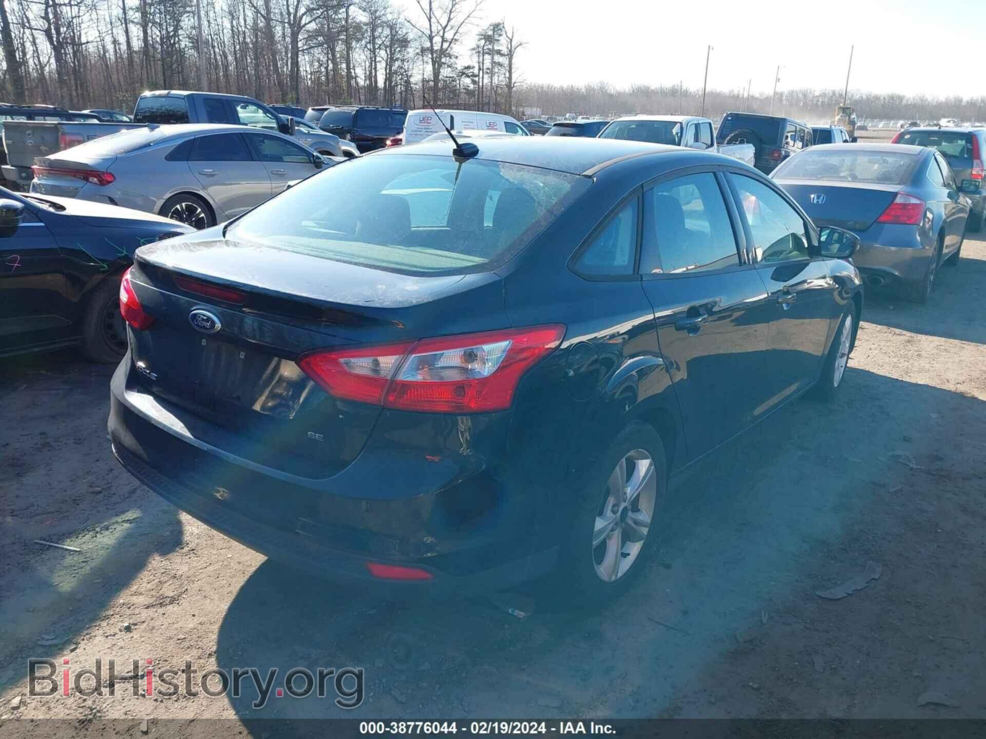 2014 FORD FOCUS - VIN: 1FADP3F2XEL434509 - Photo 4