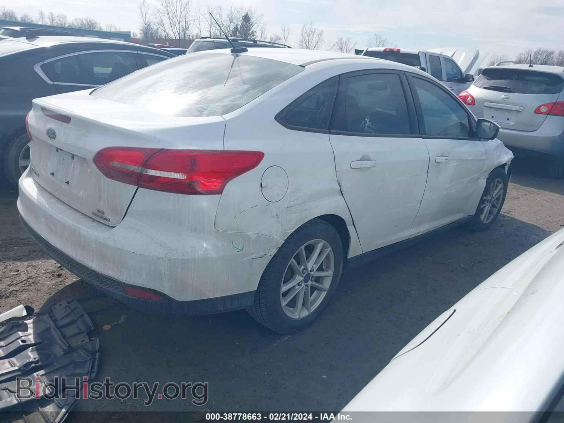 2015 FORD FOCUS - VIN: 1FADP3F21FL217030 - Photo 4