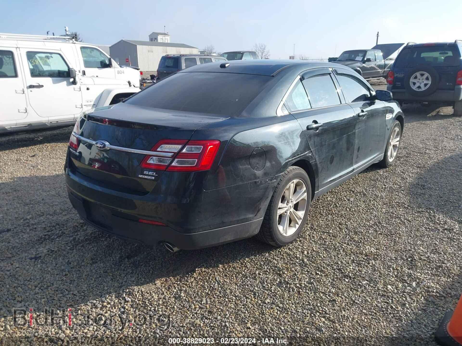 2014 FORD TAURUS - VIN: 1FAHP2E87EG117040 - Photo 4