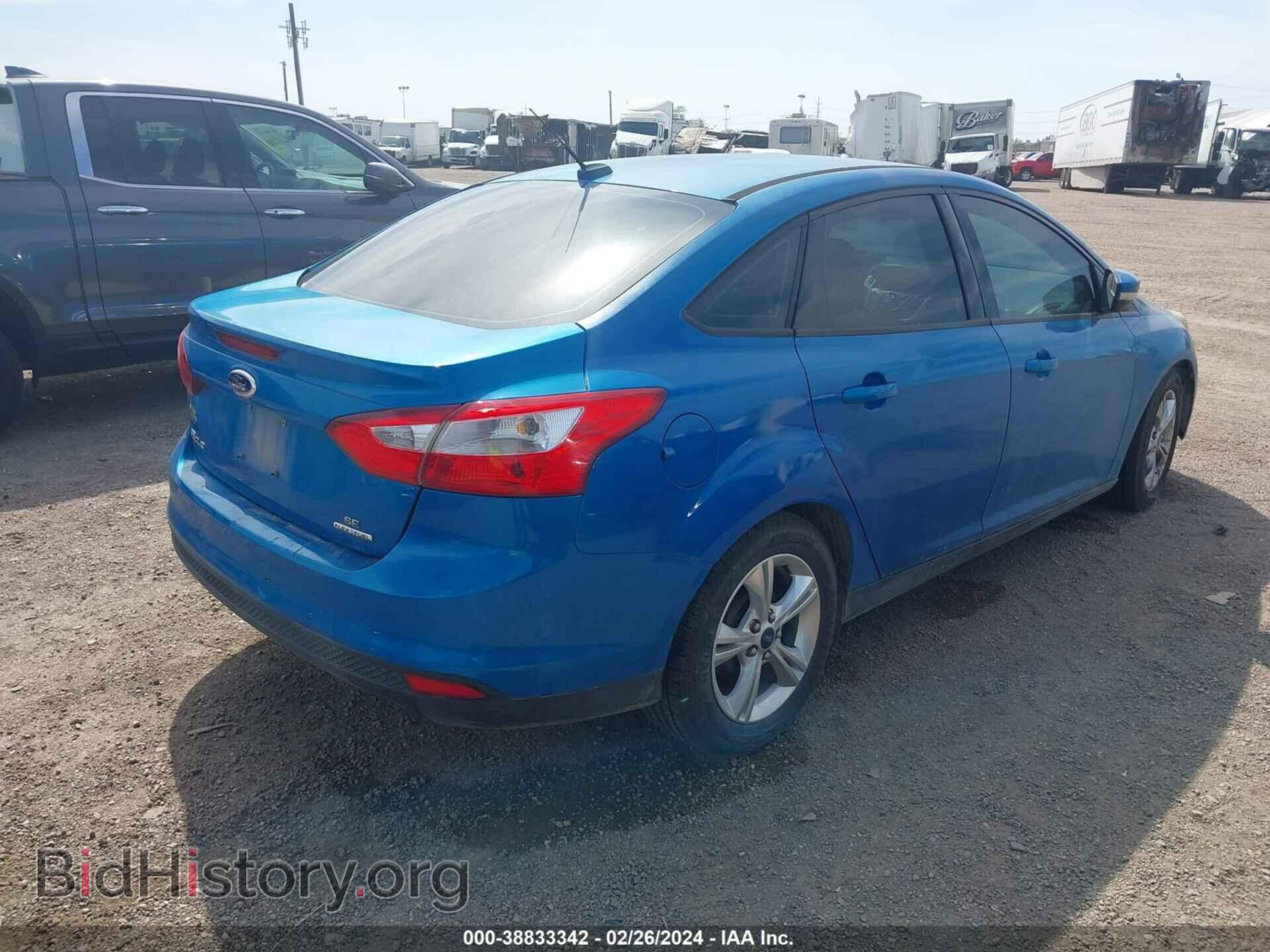 2014 FORD FOCUS - VIN: 1FADP3F20EL109013 - Photo 4
