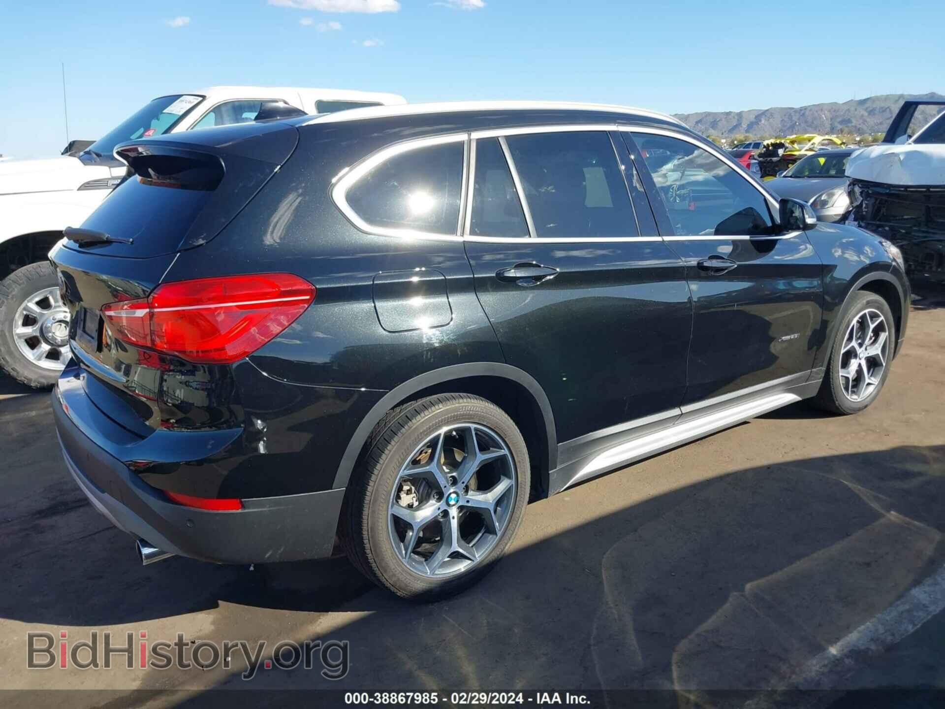2016 BMW X1 - VIN: WBXHT3C36G5E54564 - Фото 4