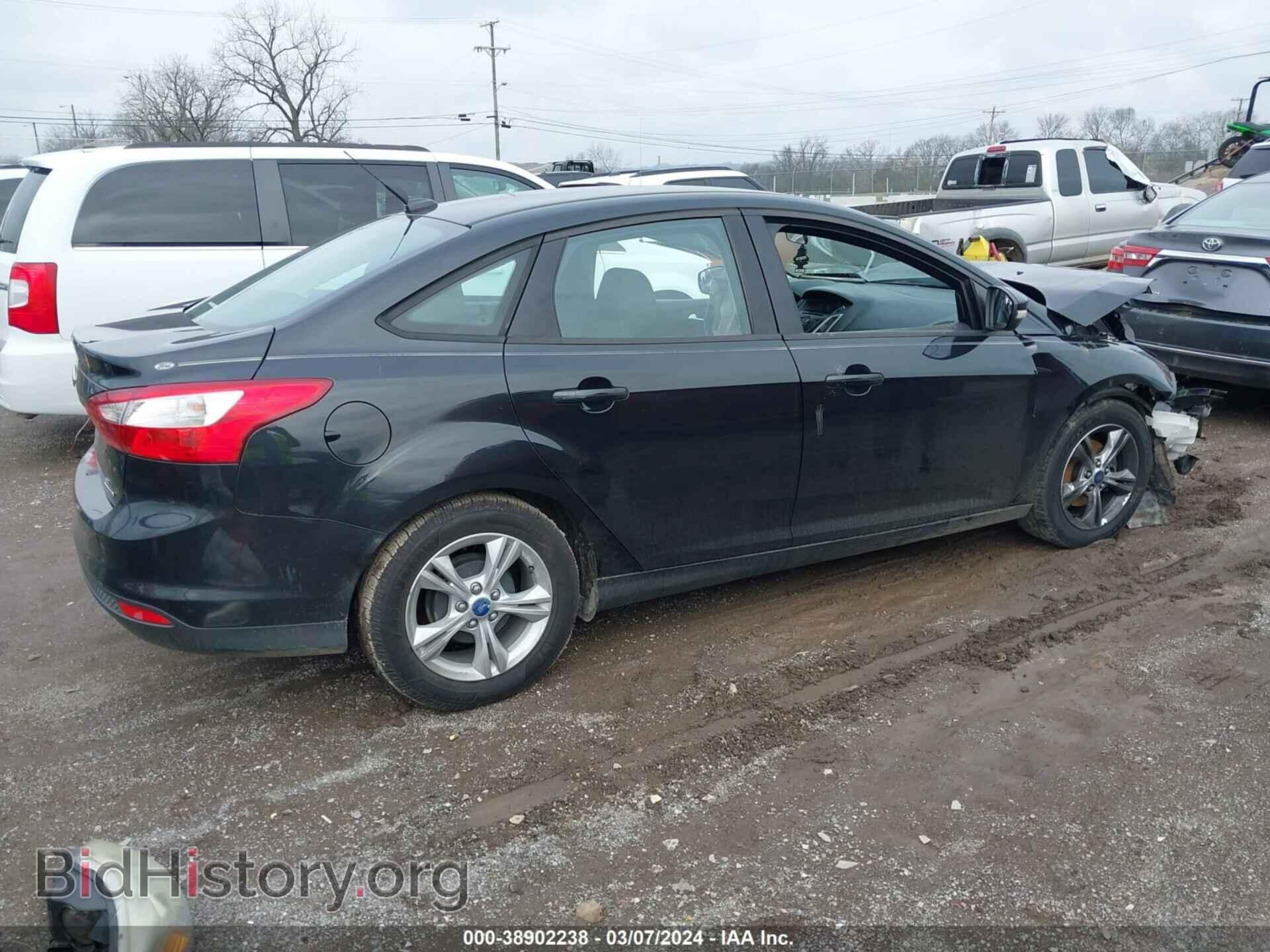 2014 FORD FOCUS - VIN: 1FADP3F24EL129751 - Photo 4