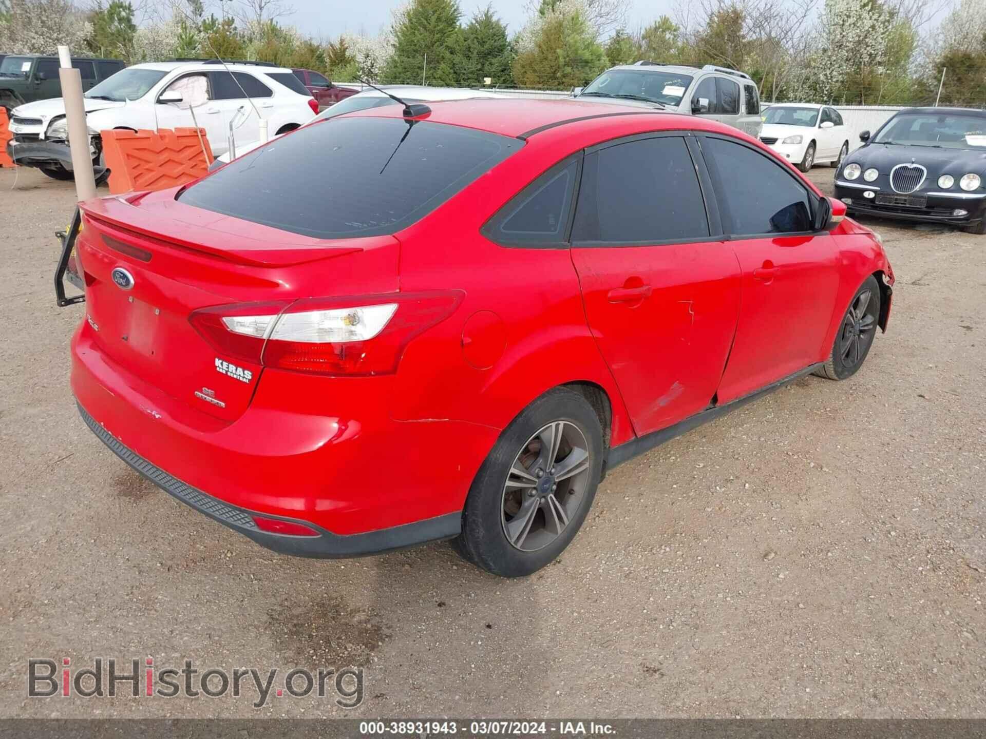 2014 FORD FOCUS - VIN: 1FADP3F28EL143121 - Photo 4