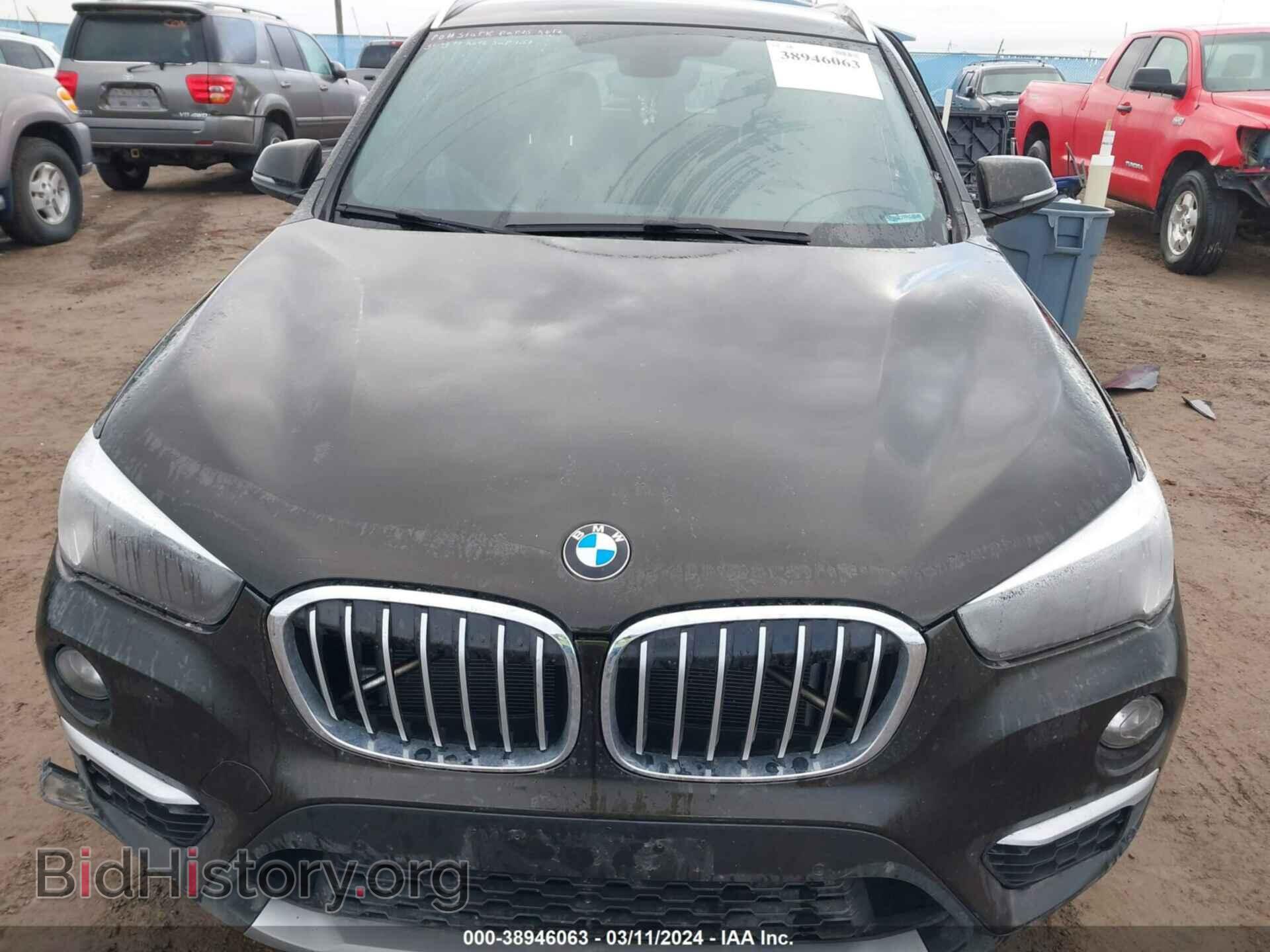 2017 BMW X1 - VIN: WBXHT3C37H5F81101 - Фото 13