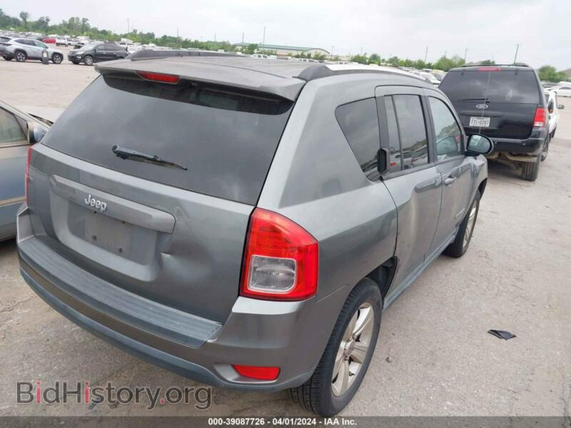 2011 Jeep COMPASS (VIN 1J4NT1FA7BD288009) — photo 4 of 11